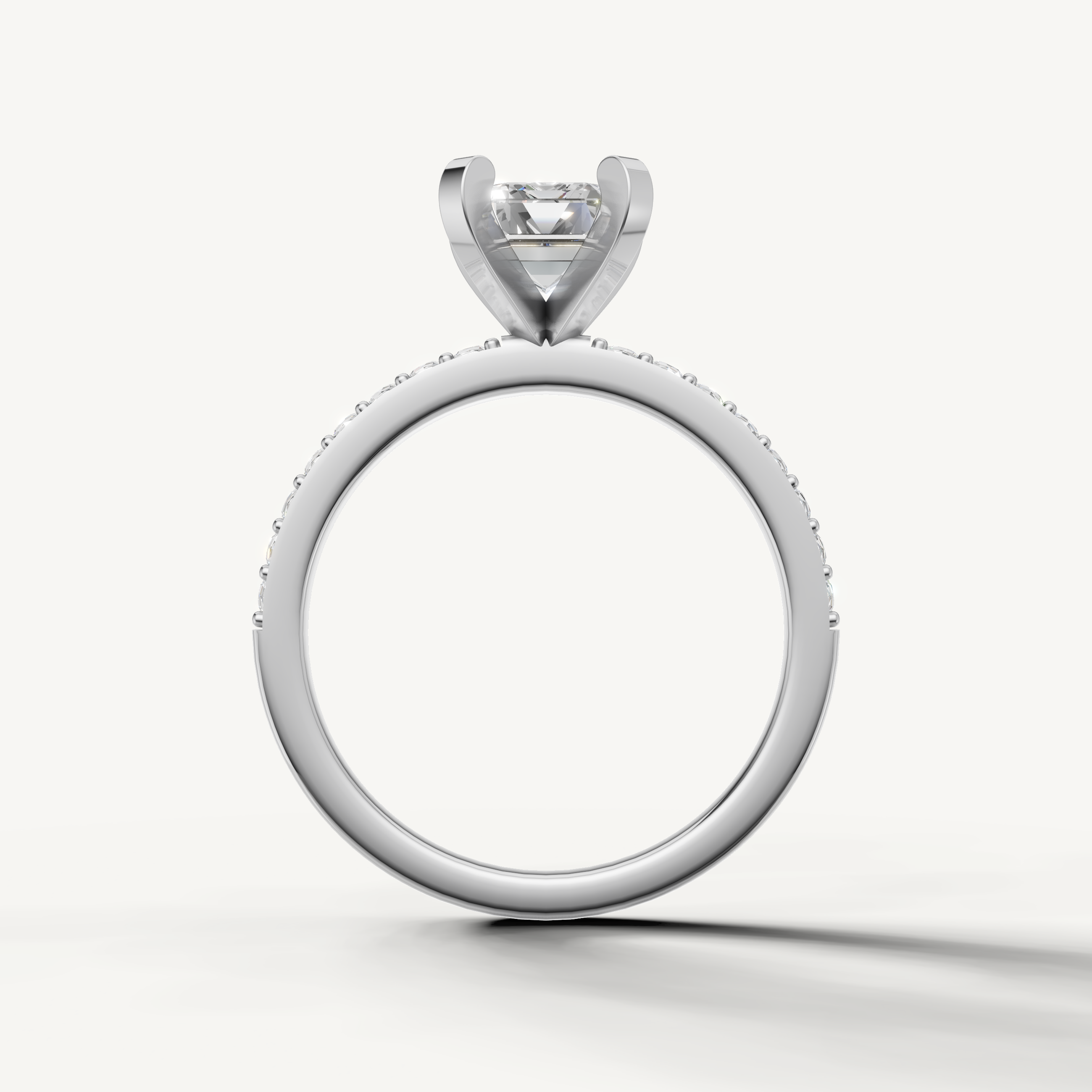 Classic emerald cut lab grown diamond ring in white gold pavé band