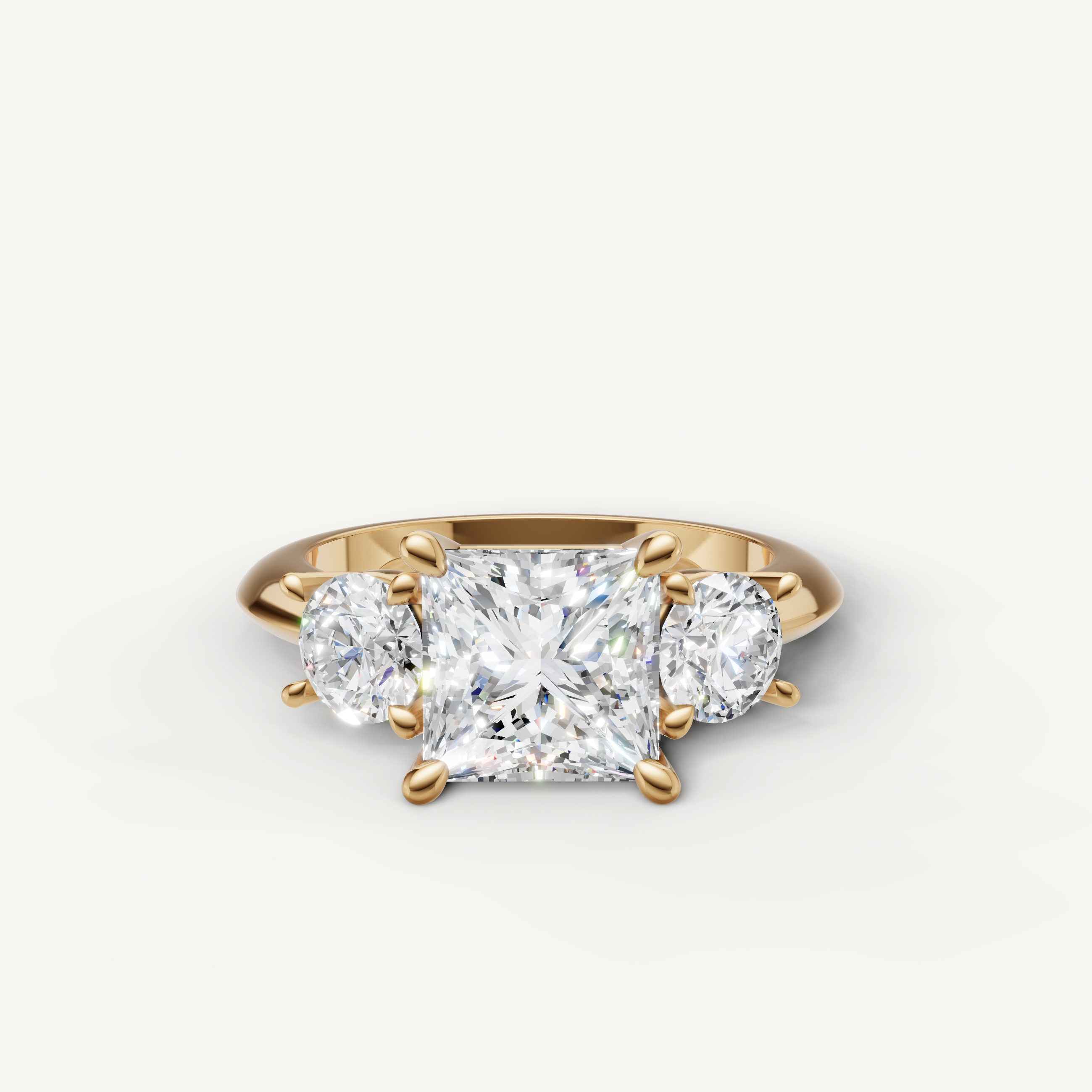 Princess cut three stone lab grown diamond engagement ring in 14K yellow gold
