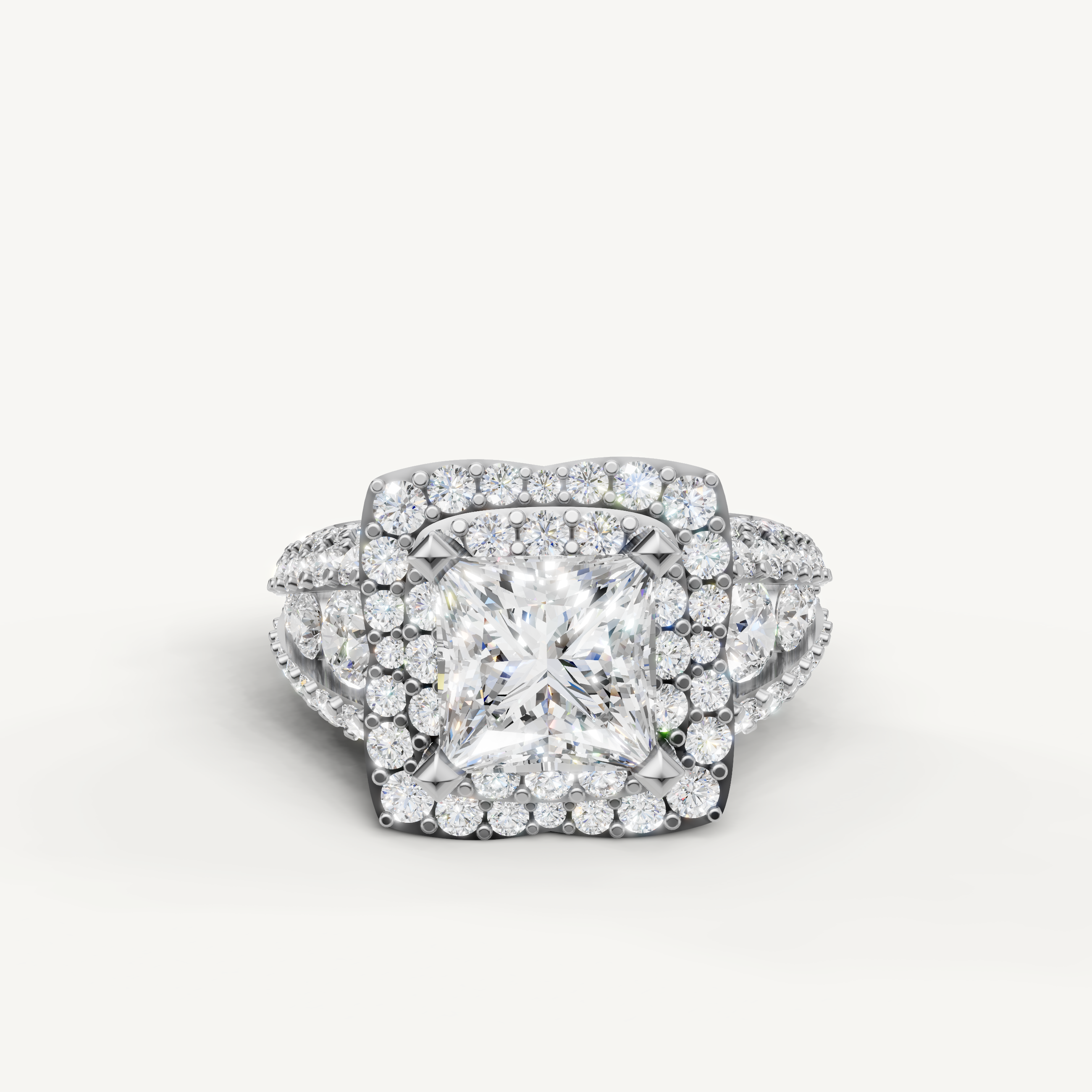 White gold princess cut halo engagement ring by Raul Diamonds.