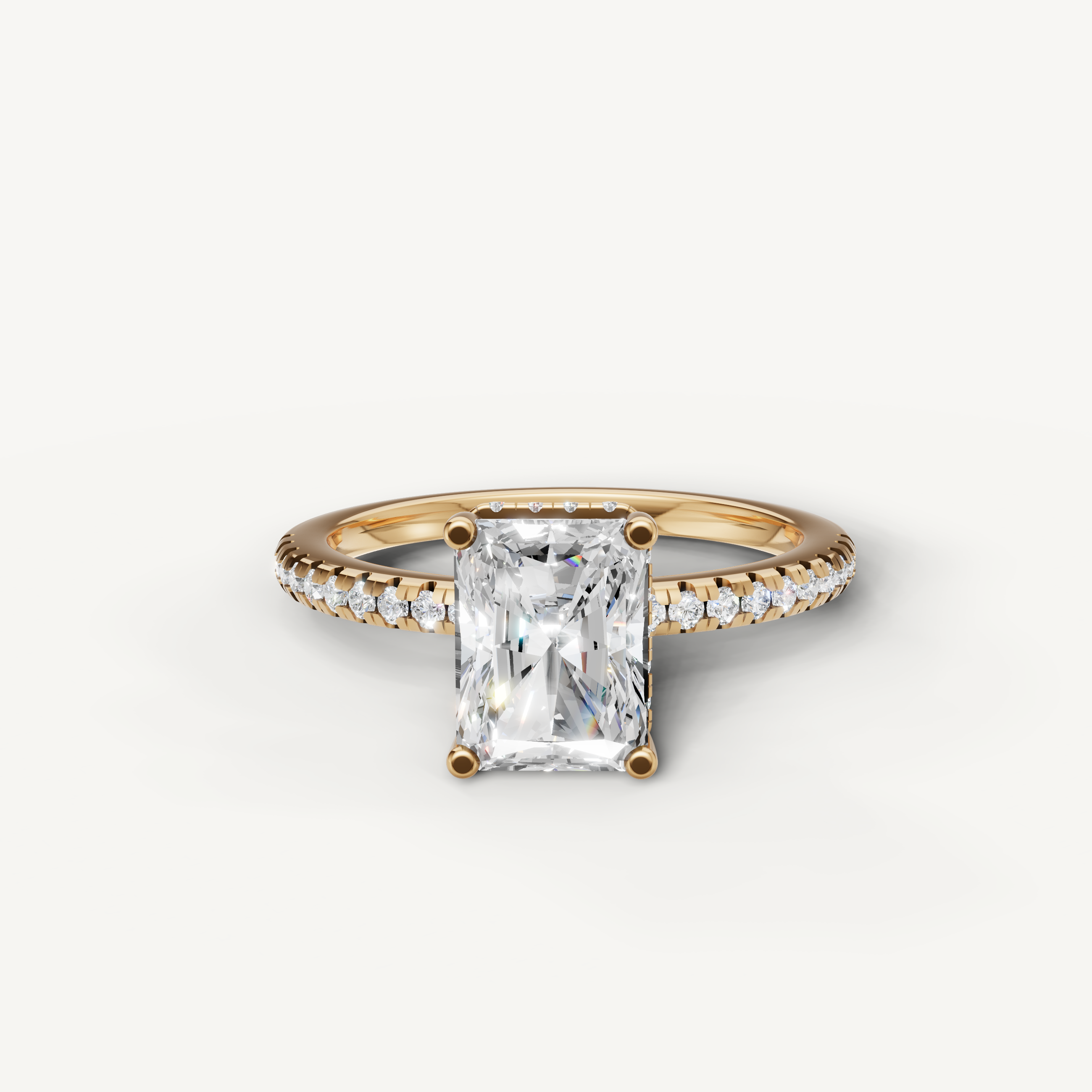 radiant cut lab grown diamond engagement ring with pavé band in 14k yellow gold