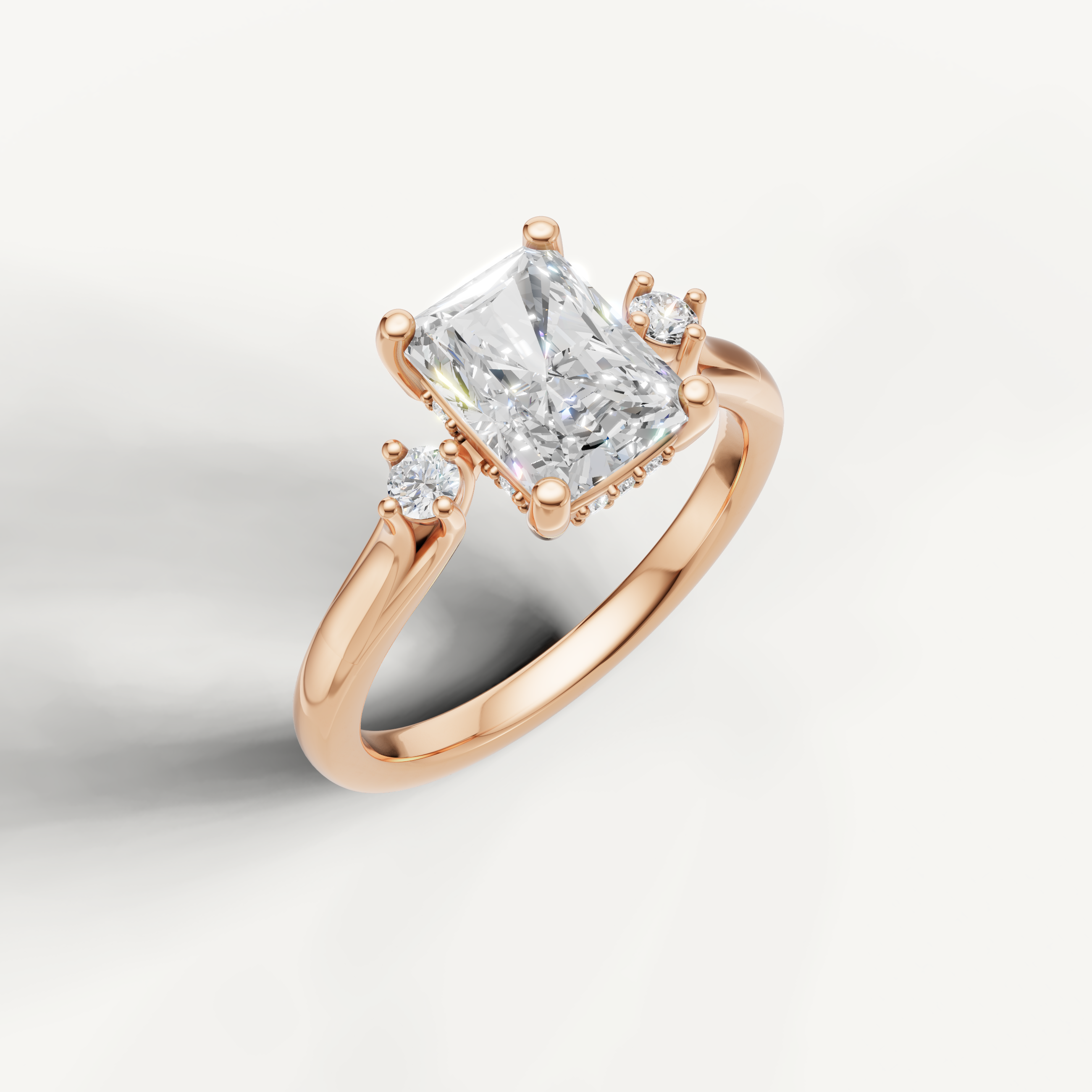Radiant cut lab grown diamond engagement ring in 14K rose gold with petite side diamonds