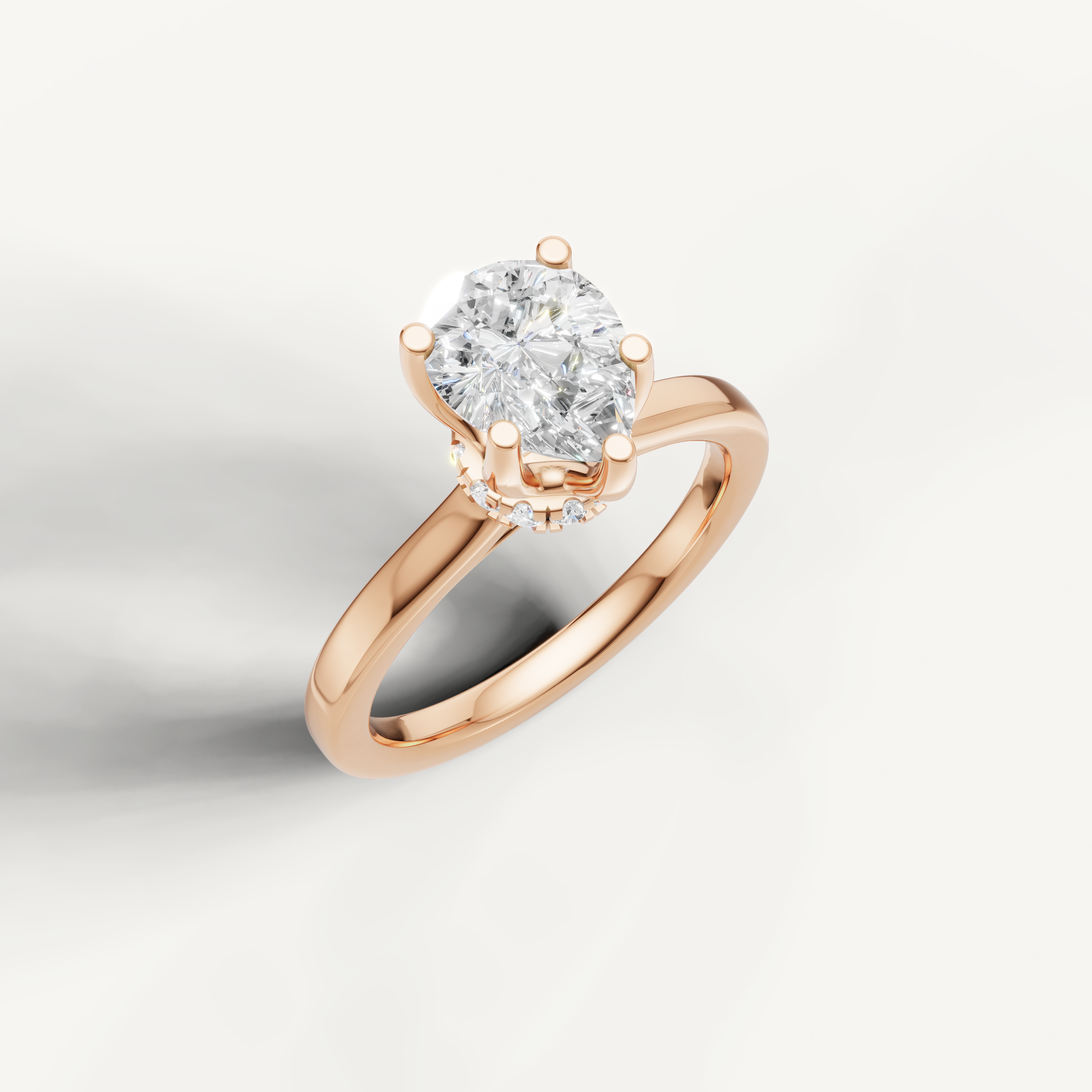 romantic pear shaped lab grown diamond ring with polished rose gold band