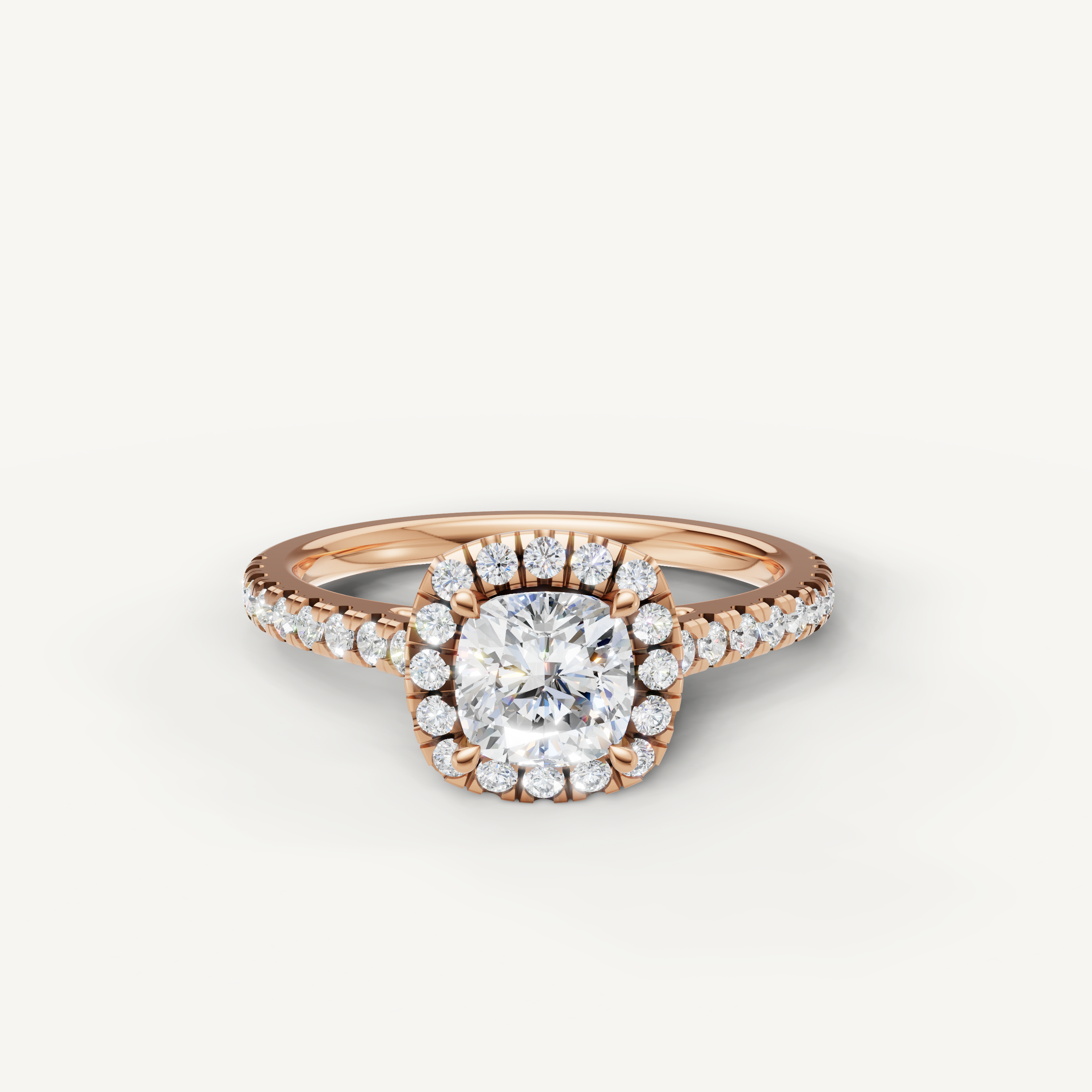 cushion cut lab grown diamond halo engagement ring with pavé band in 14k rose gold