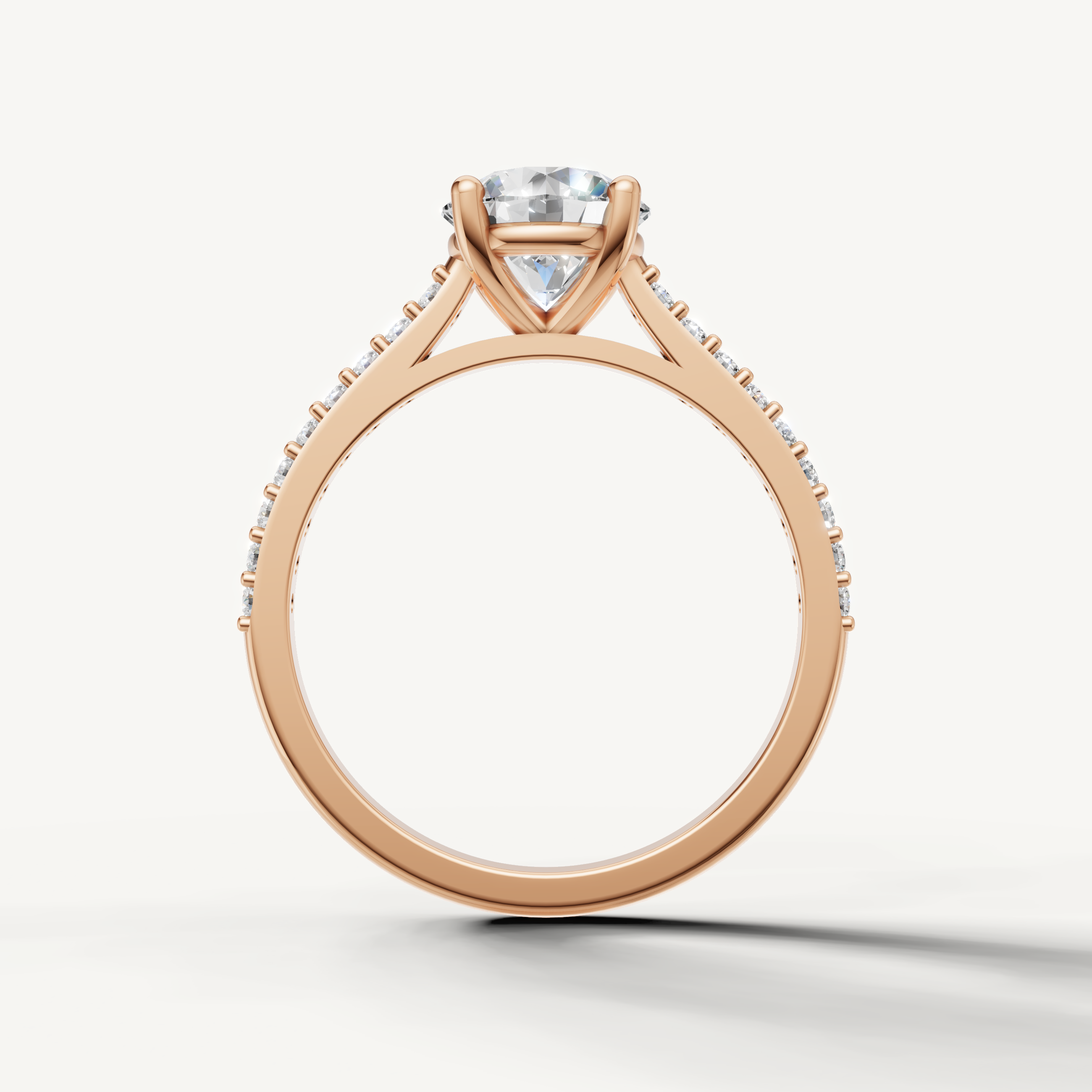 Handcrafted rose gold round diamond bridal ring from Raul Diamonds.