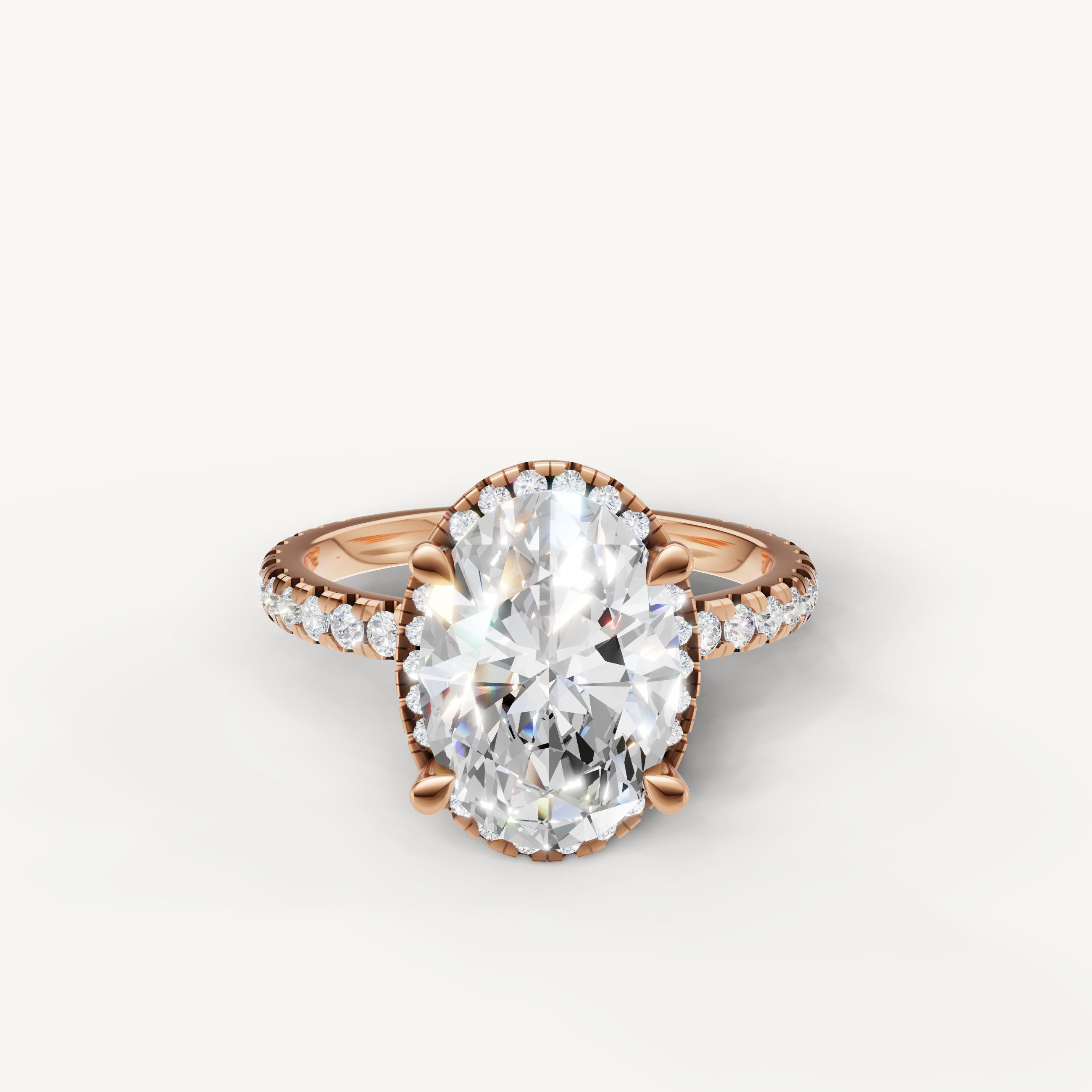 Oval cut lab grown diamond engagement ring with hidden halo pavé band rose gold