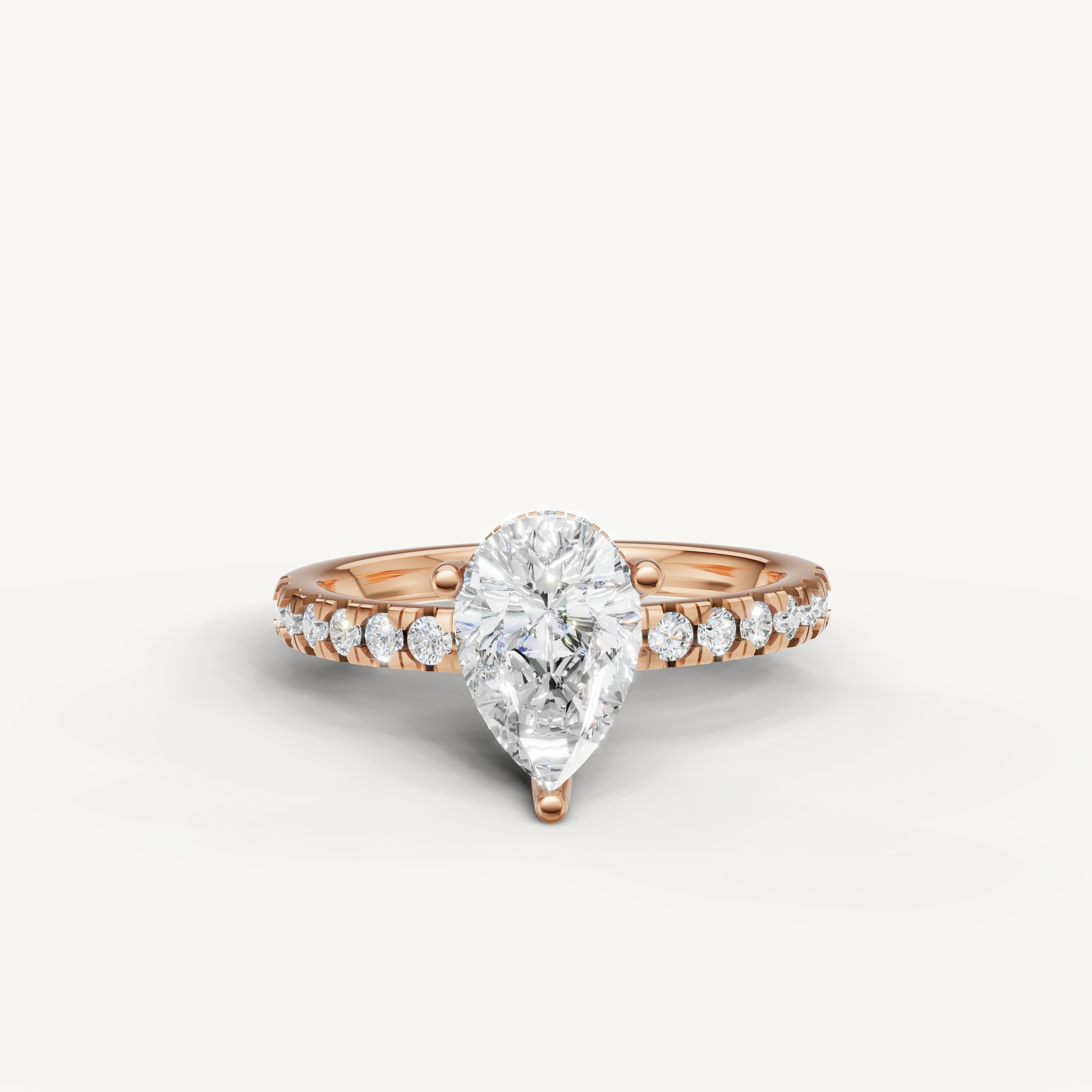 pear cut lab grown diamond engagement ring with pavé band rose gold