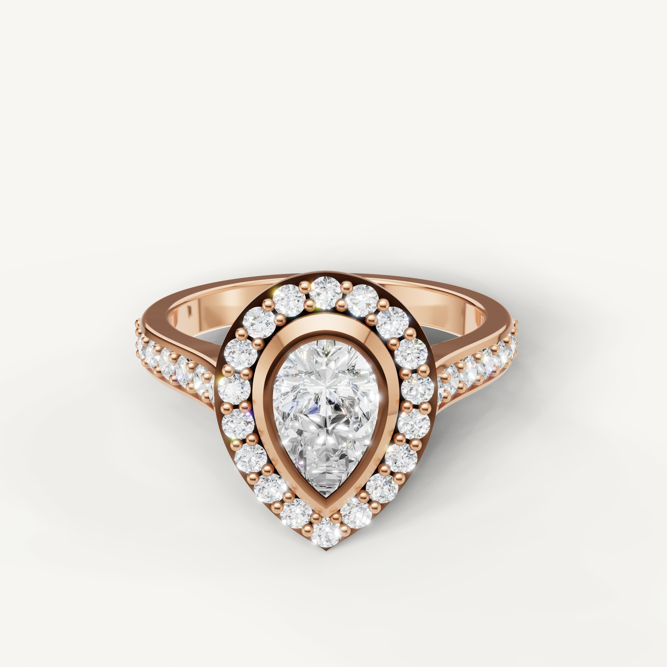 Raul Diamonds rose gold pear engagement ring with pavé diamond shank