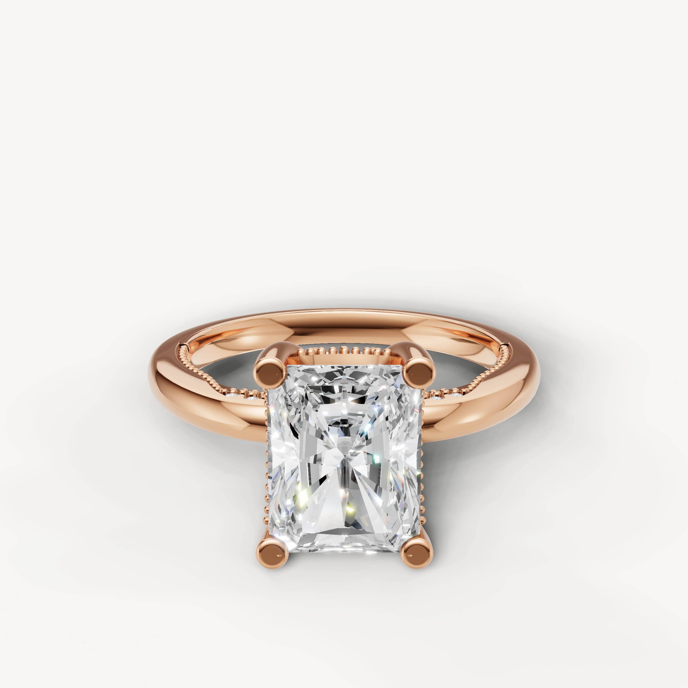 A romantic and modern engagement ring crafted in blushing 14k rose gold, featuring a striking oval-cut diamond held by delicate prongs.