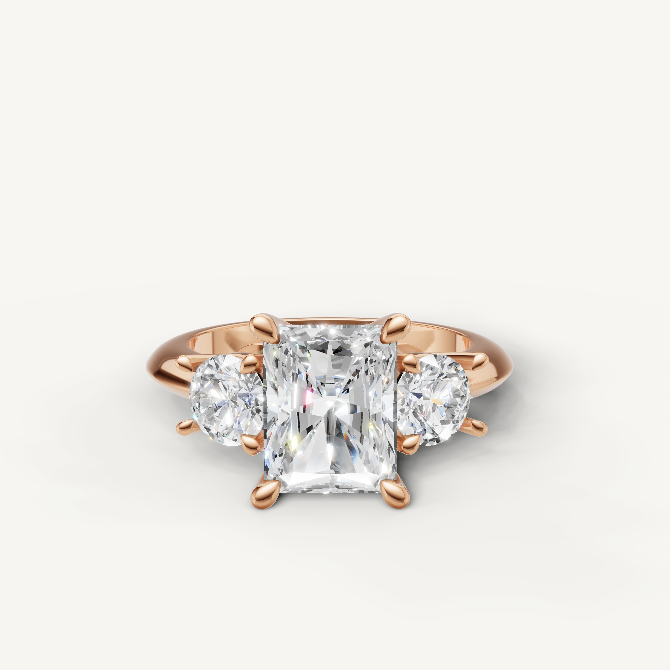Radiant cut three stone lab grown diamond engagement ring in 14K rose gold