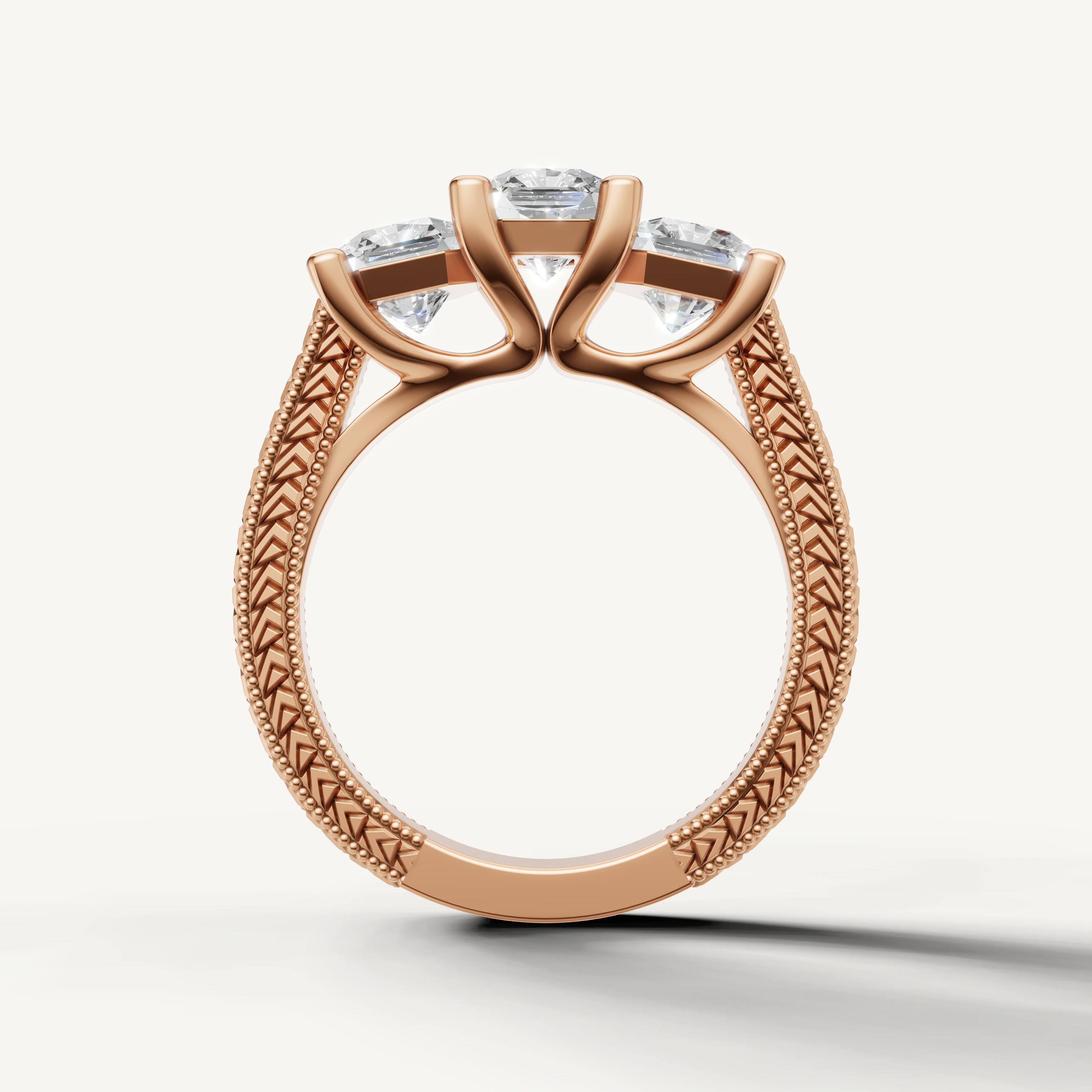 Rose gold round diamond anniversary ring with timeless three stone setting.