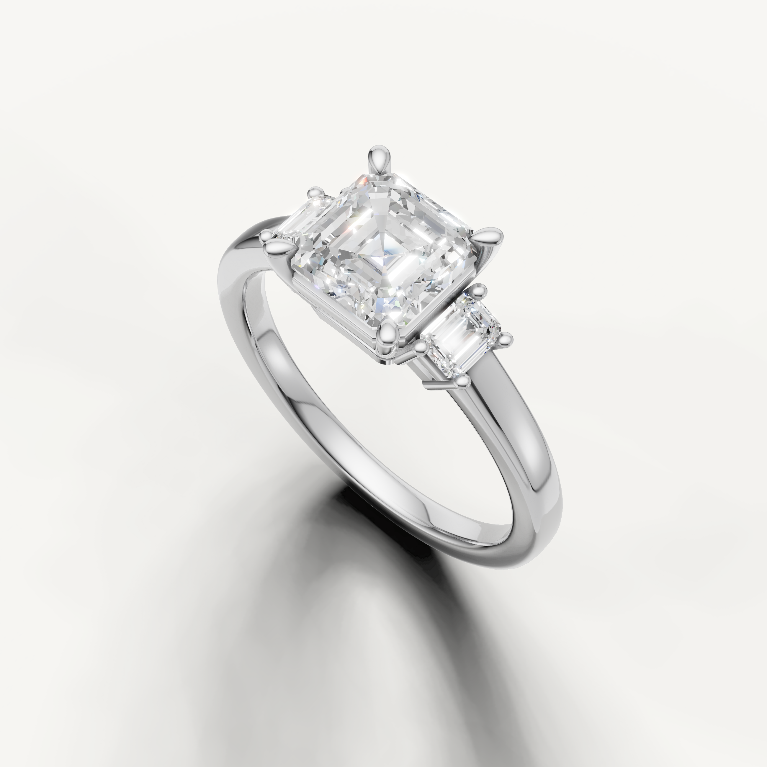 Elegant Asscher cut three stone lab grown diamond ring in white gold with geometric side stones