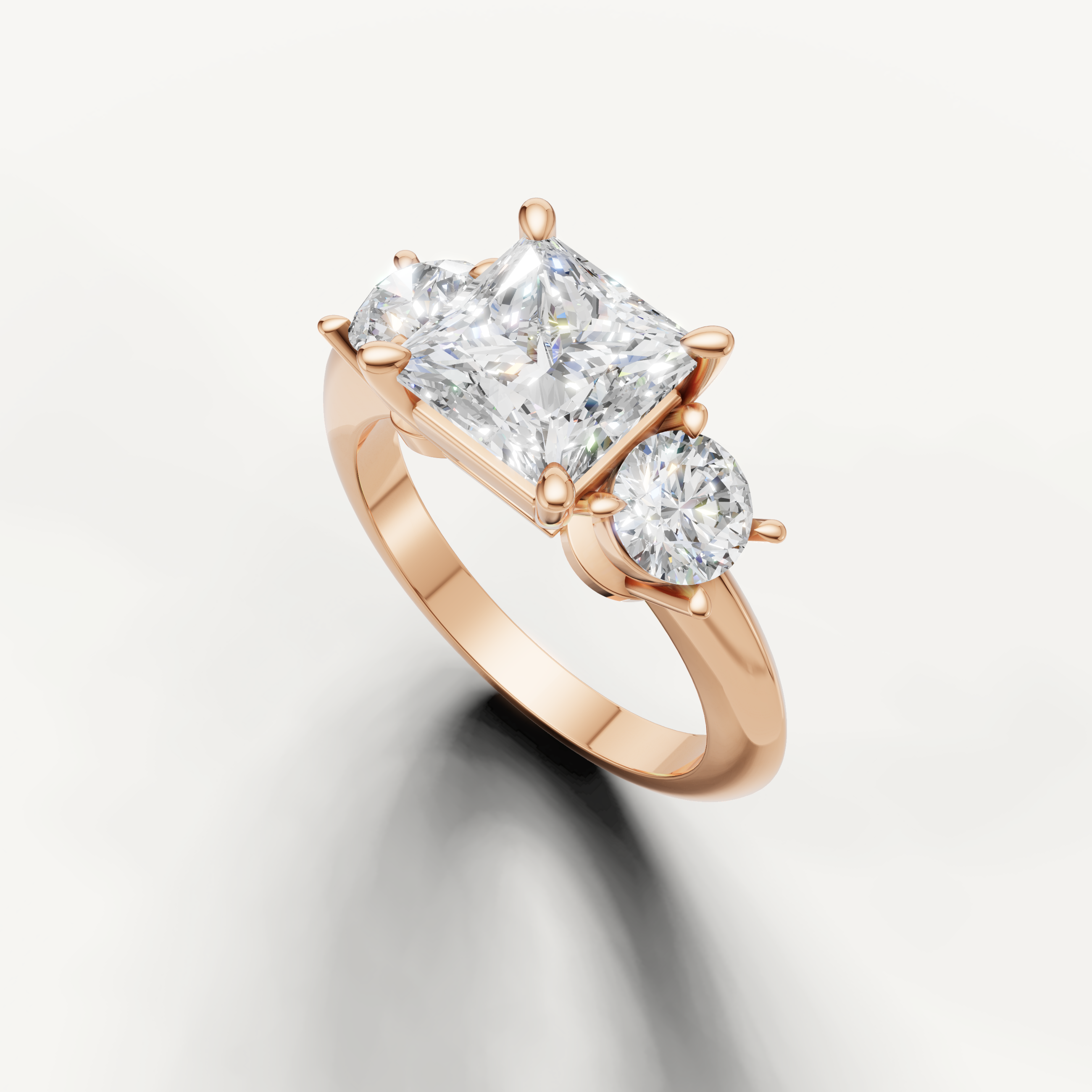 Three stone princess cut diamond ring in rose gold classic engagement setting