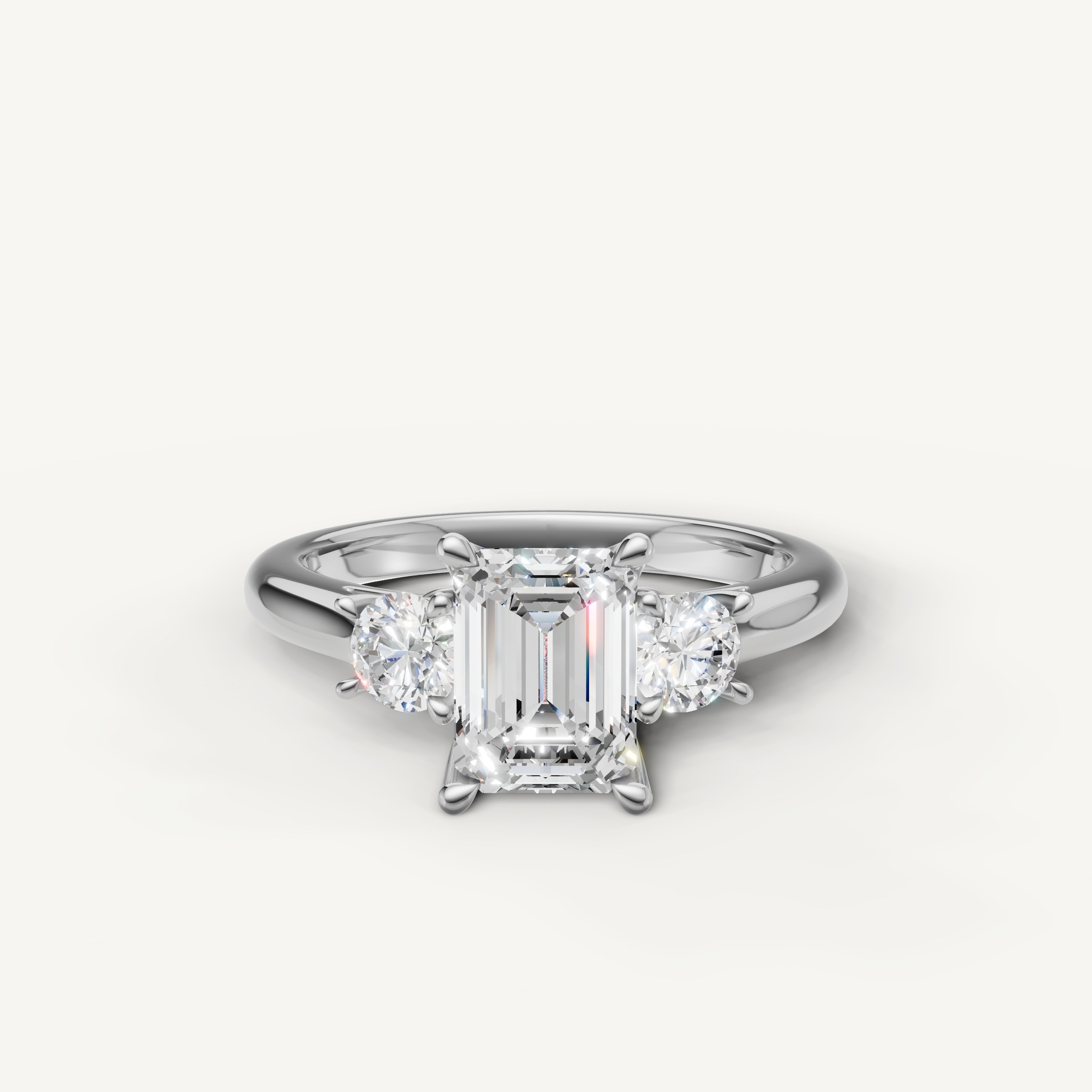 Emerald cut three stone lab grown diamond engagement ring in 14K white gold