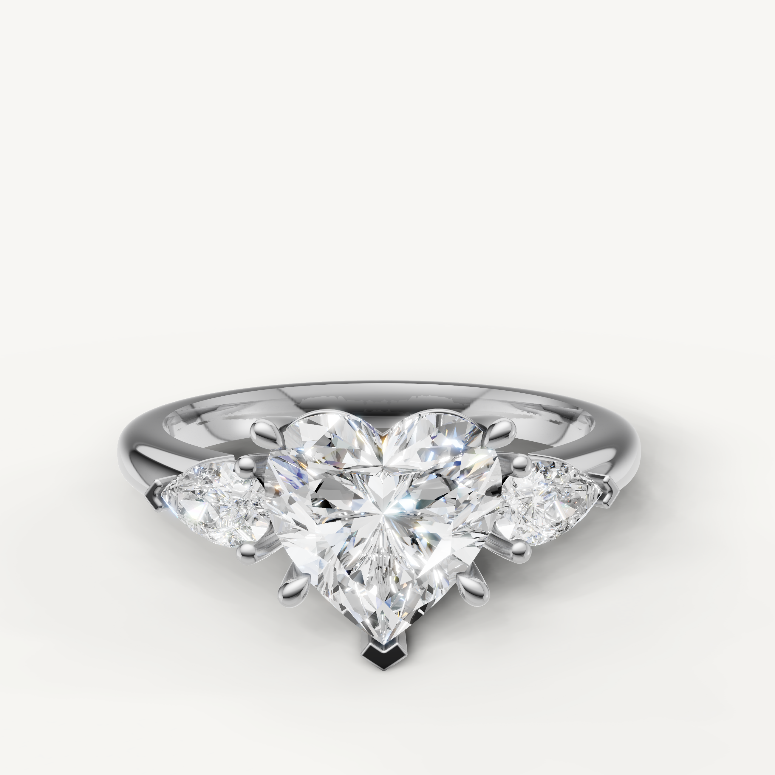 heart cut lab grown diamond engagement ring with pear side stones white gold
