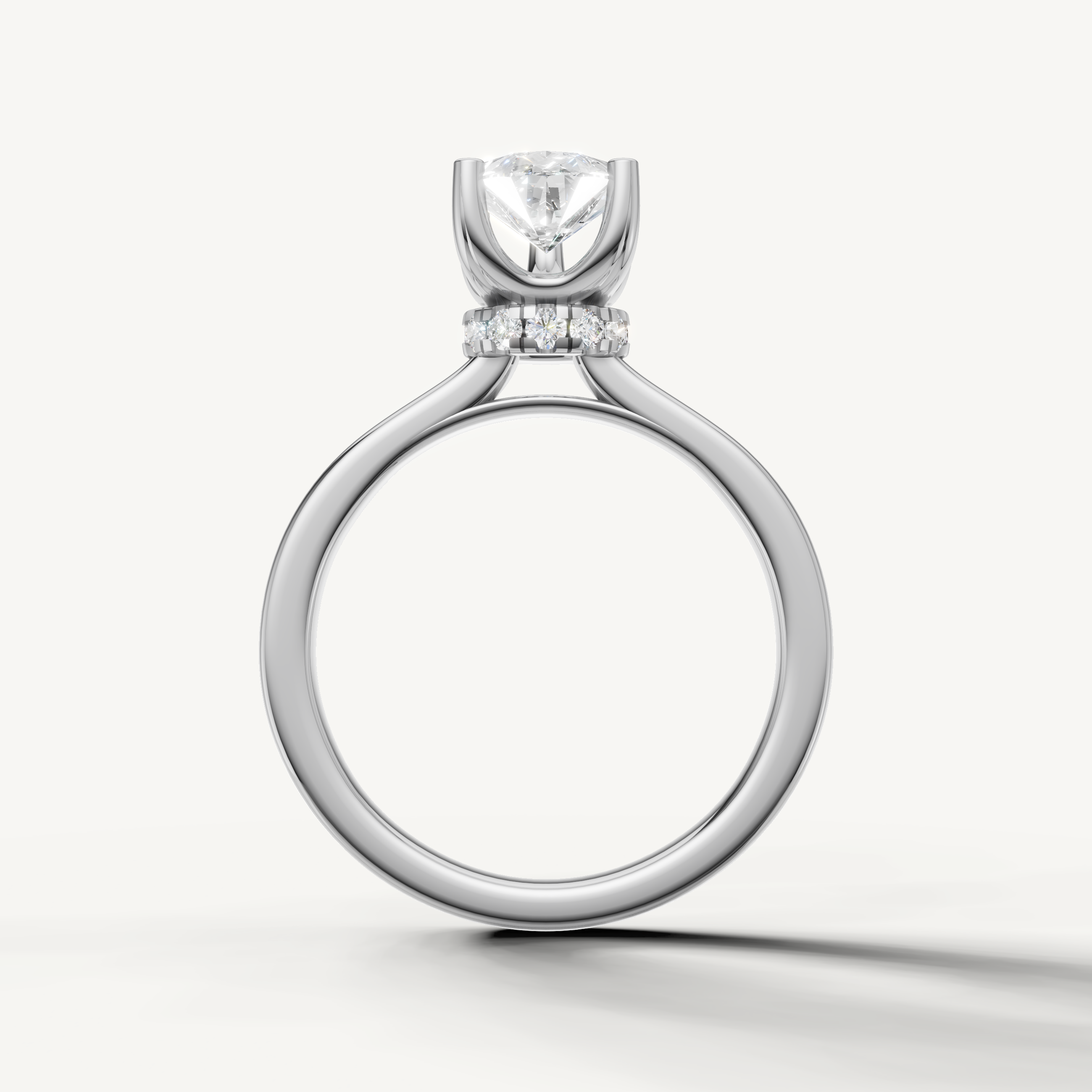 minimalist pear shaped lab grown diamond engagement ring with elegant white gold setting