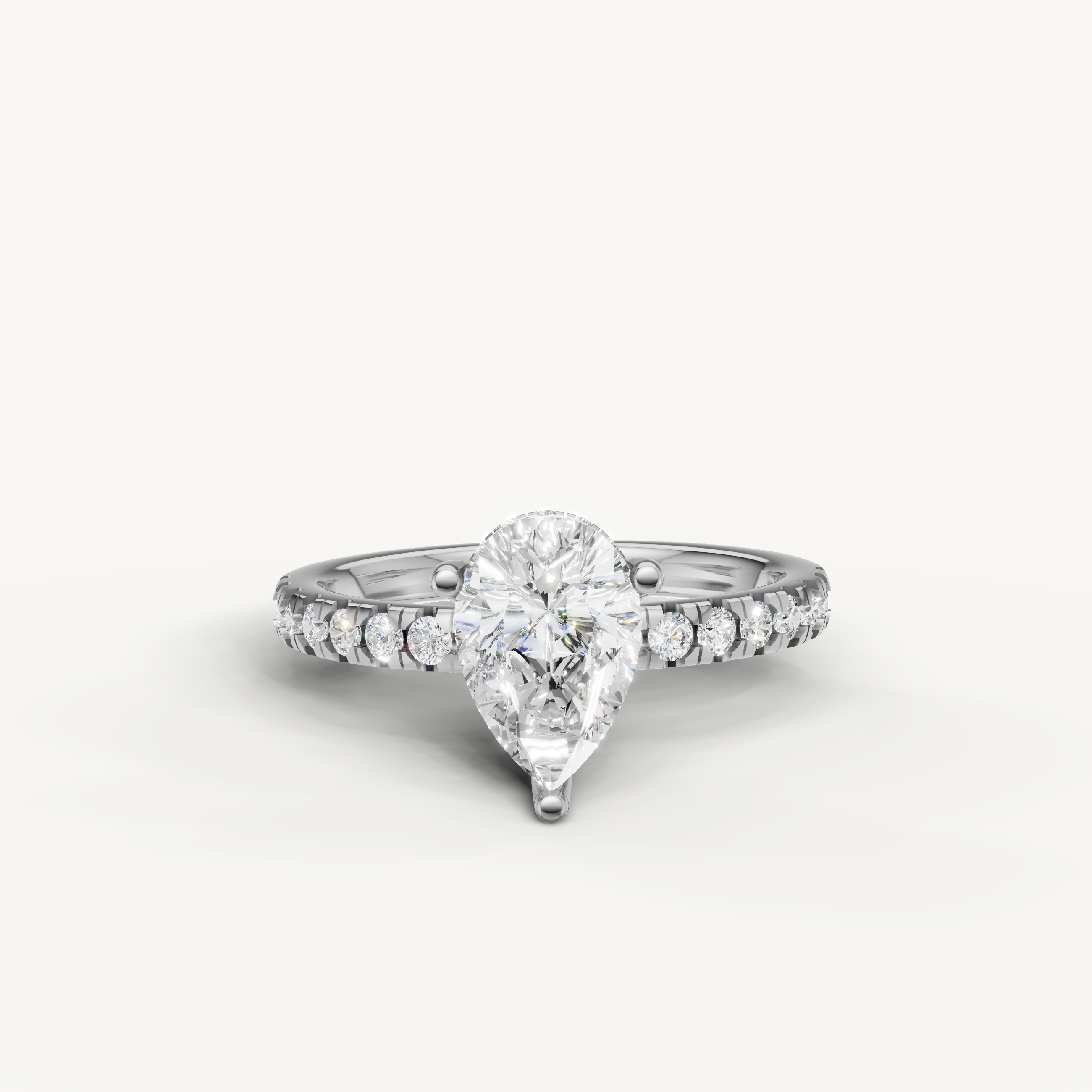 pear cut lab grown diamond engagement ring with pavé band white gold