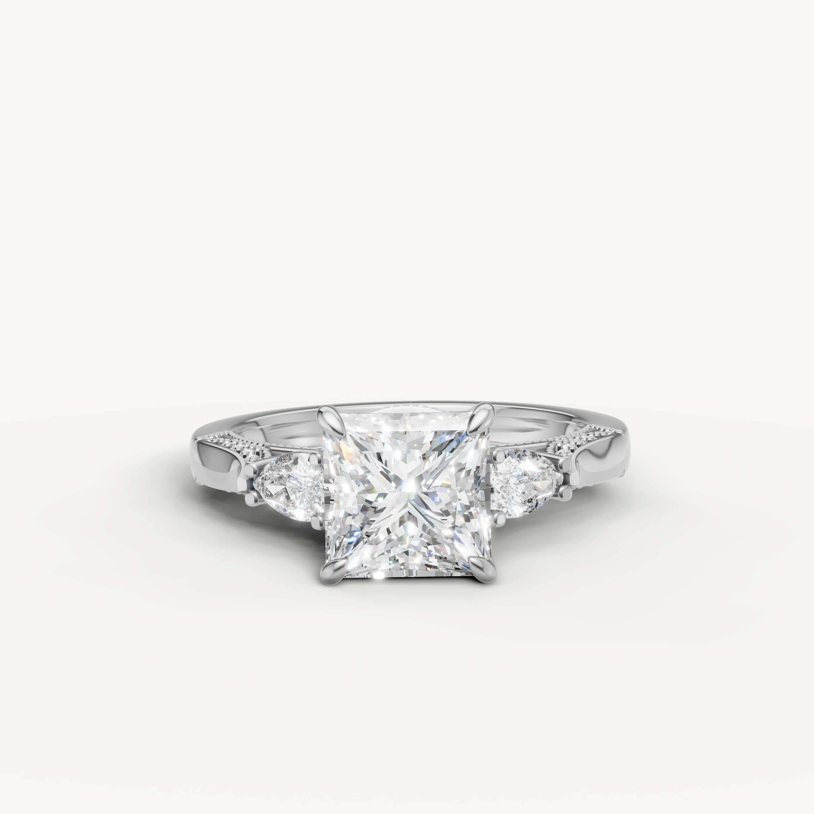 Princess cut lab grown diamond three stone ring with pear side stones white gold engagement ring