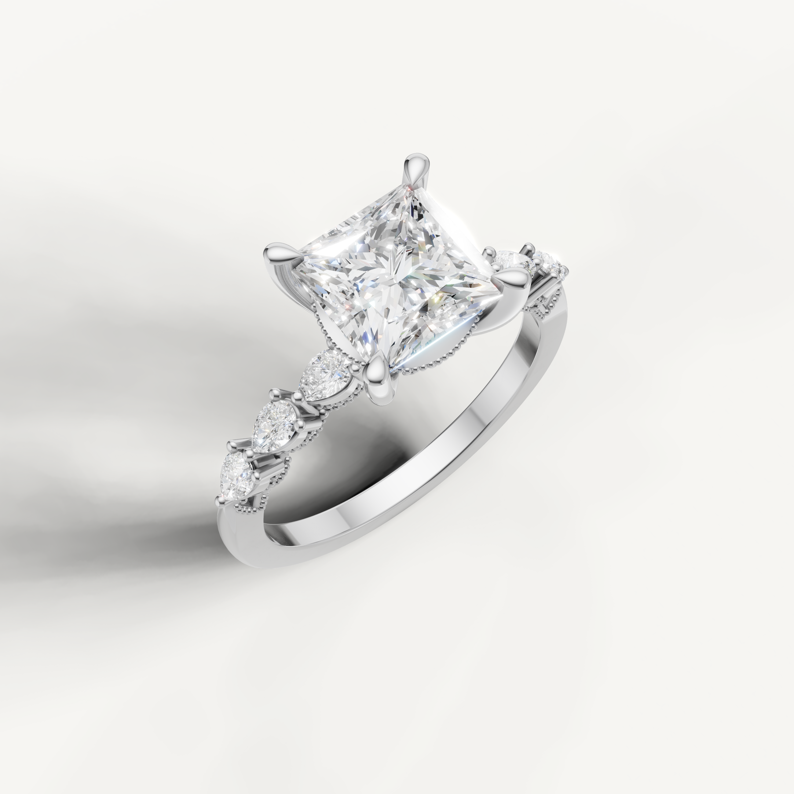 White gold princess cut lab grown diamond ring with marquise diamond accents and elegant nature inspired setting