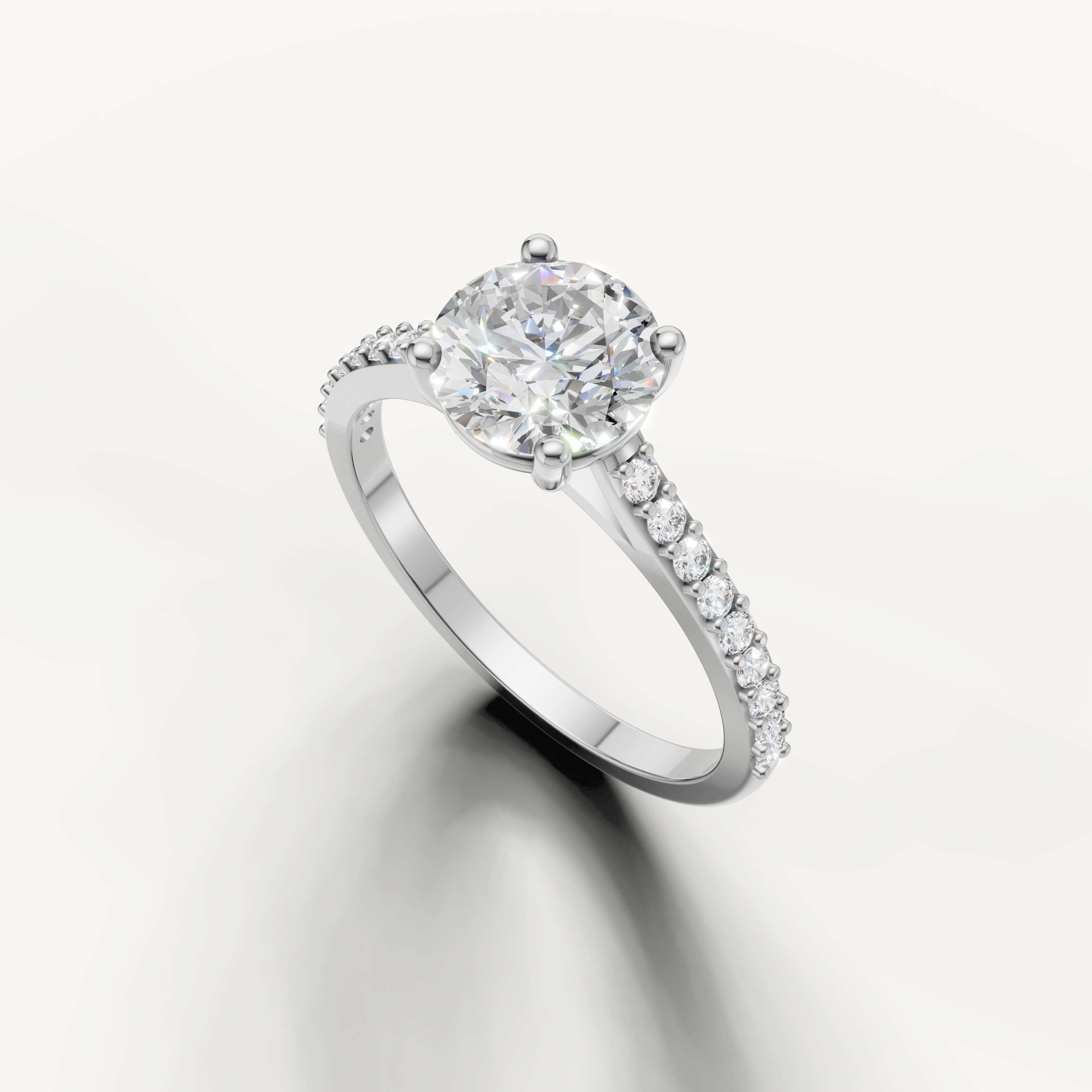 Raul Diamonds white gold round diamond ring with brilliant sparkle.
