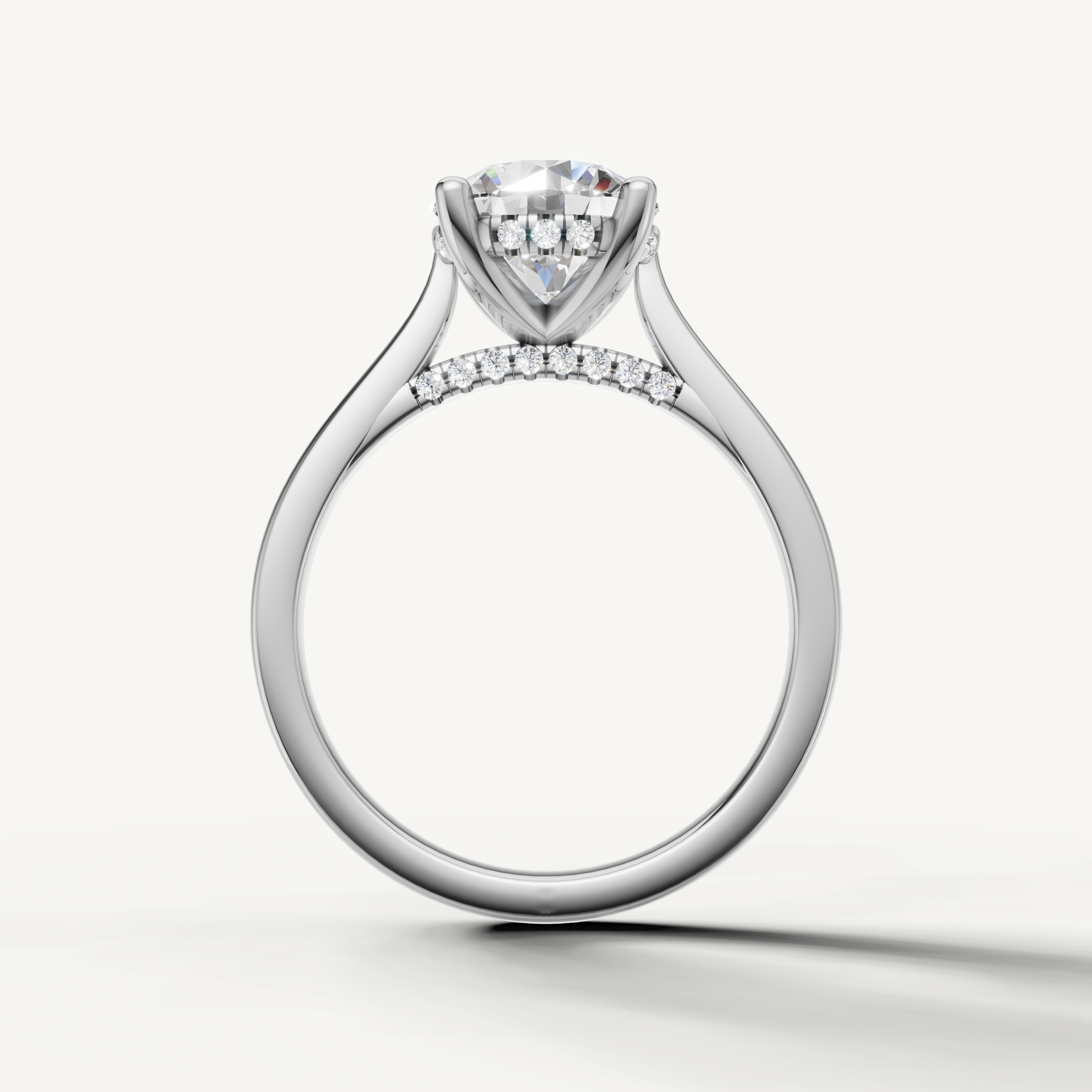 Elegant white gold round-cut lab-grown diamond ring with hidden halo and pavé accents by Raul Diamonds