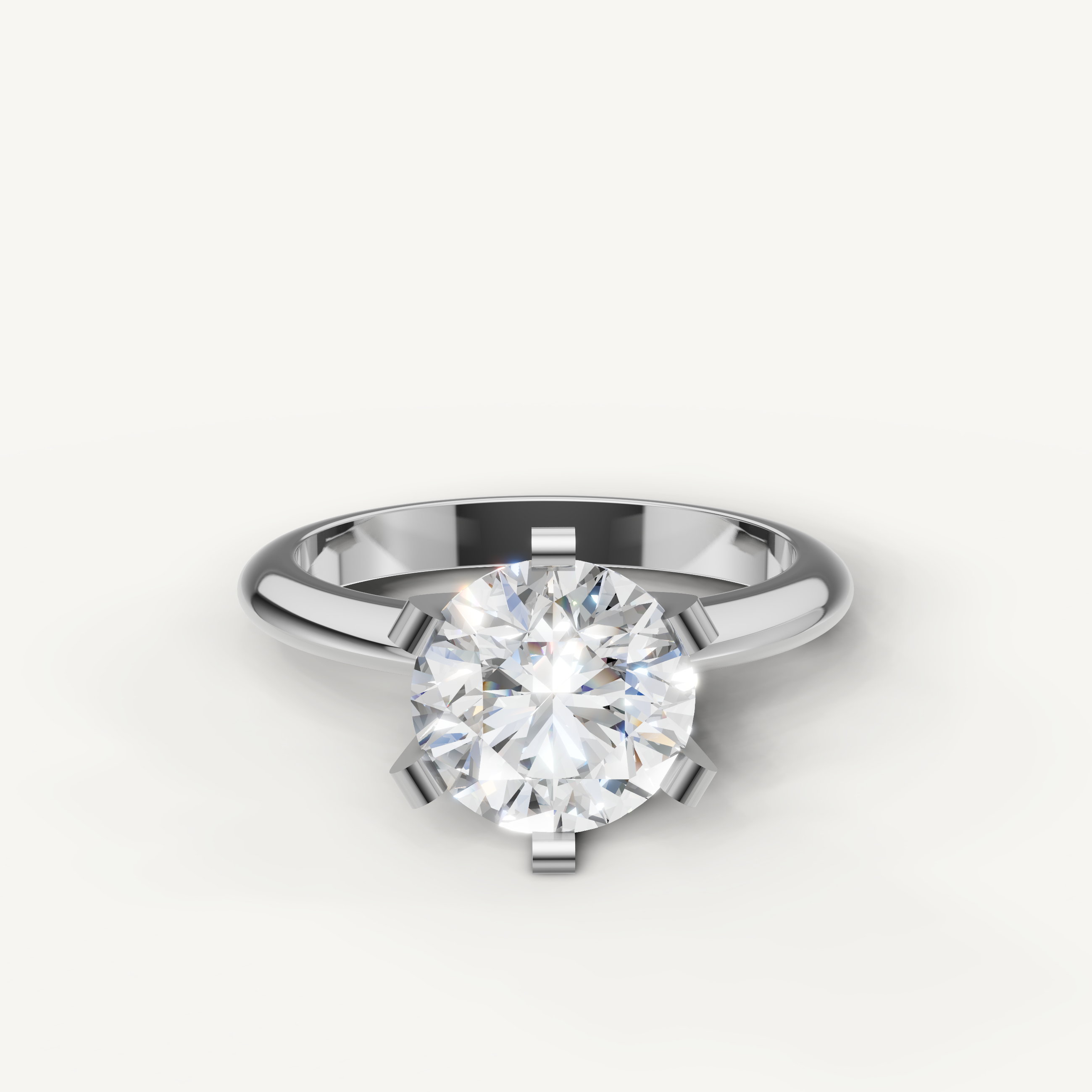 White gold round solitaire diamond ring by Raul Diamonds with brilliant sparkle.