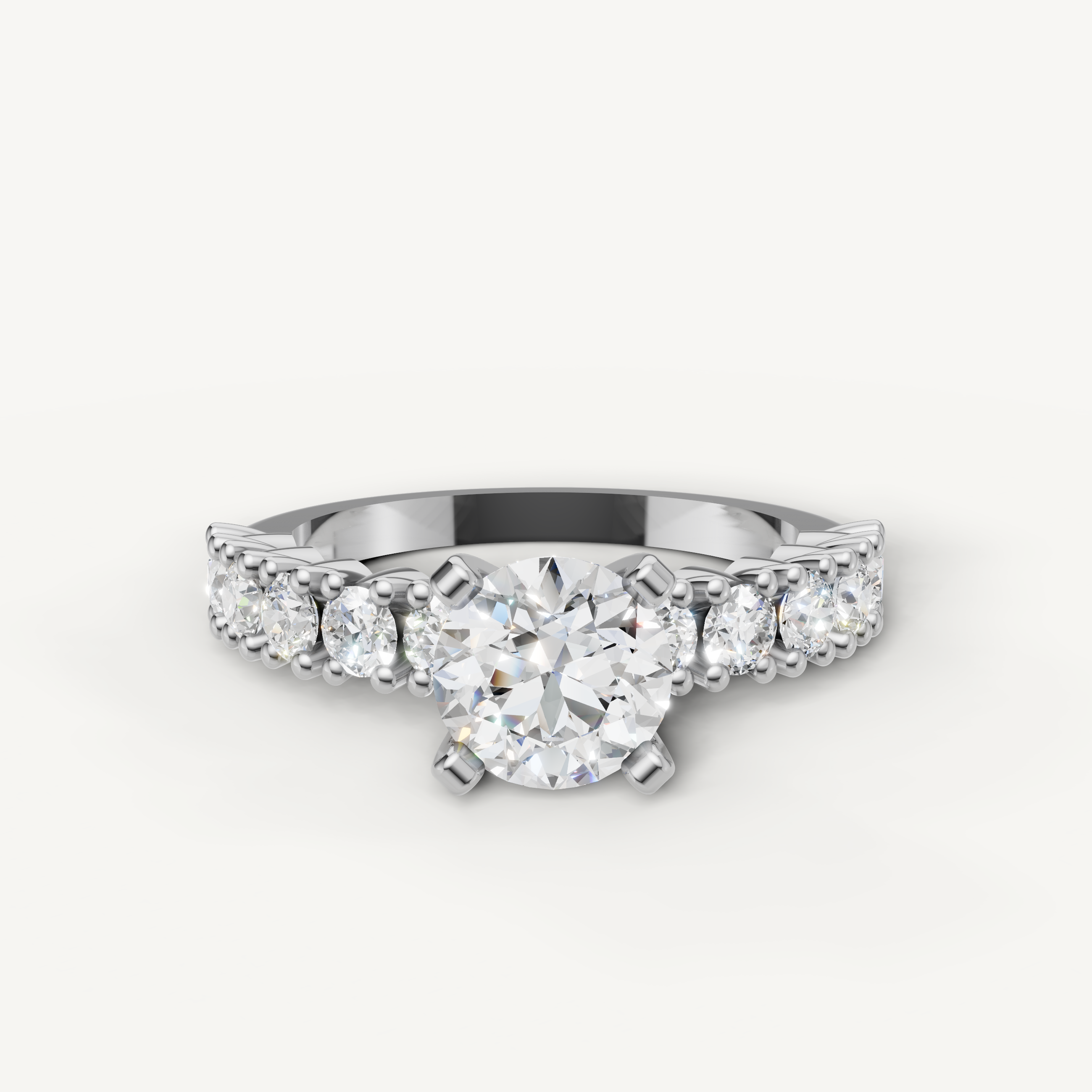 Raul Diamonds white gold round cut engagement ring with brilliant accent diamonds