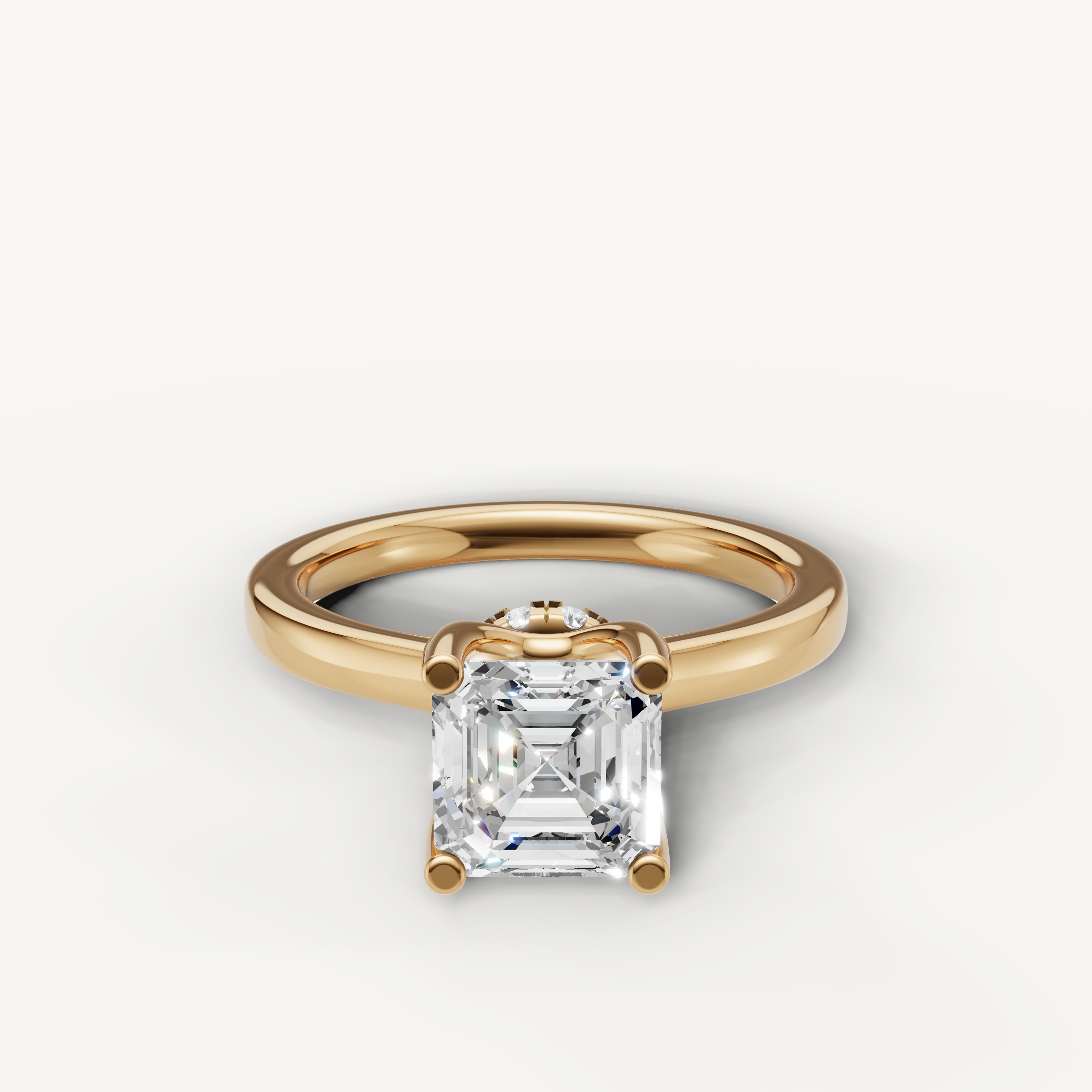 A classic solitaire engagement ring in polished 14k yellow gold, featuring a brilliant, vintage-inspired Asscher-cut diamond in a secure prong setting.