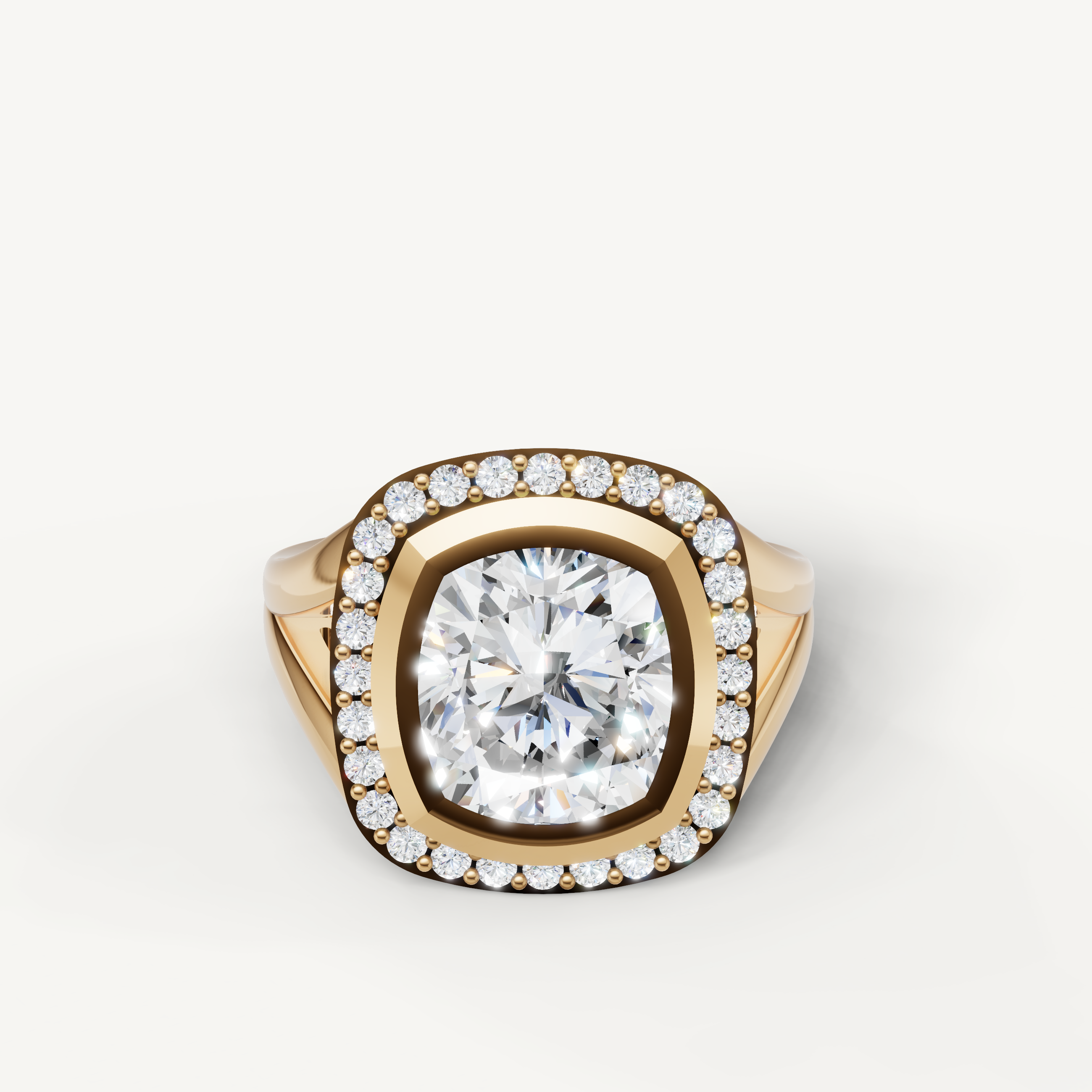 Raul Diamonds yellow gold pear diamond halo engagement ring with cushion bezel setting.