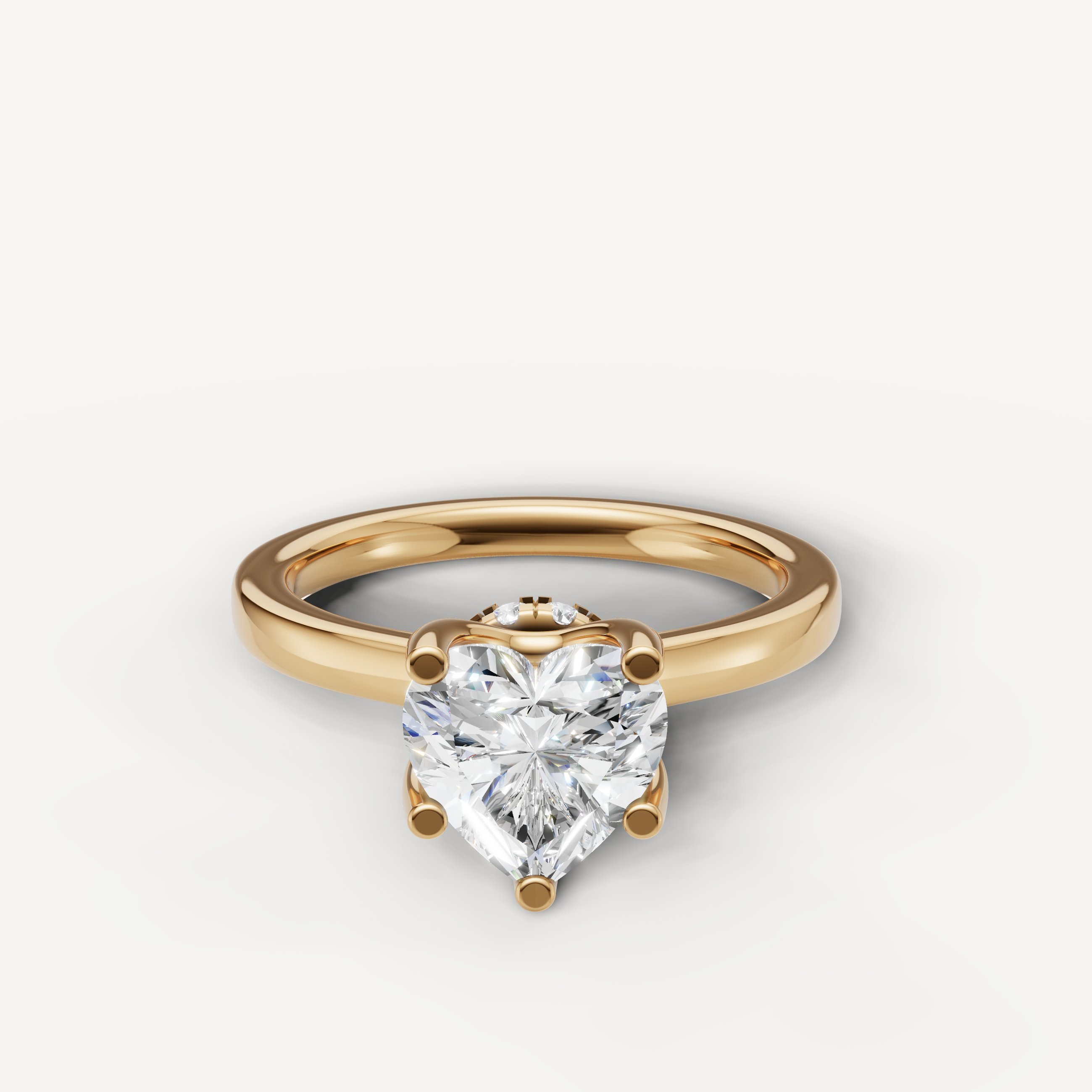 heart shaped lab grown diamond solitaire engagement ring in 14k yellow gold with hidden halo