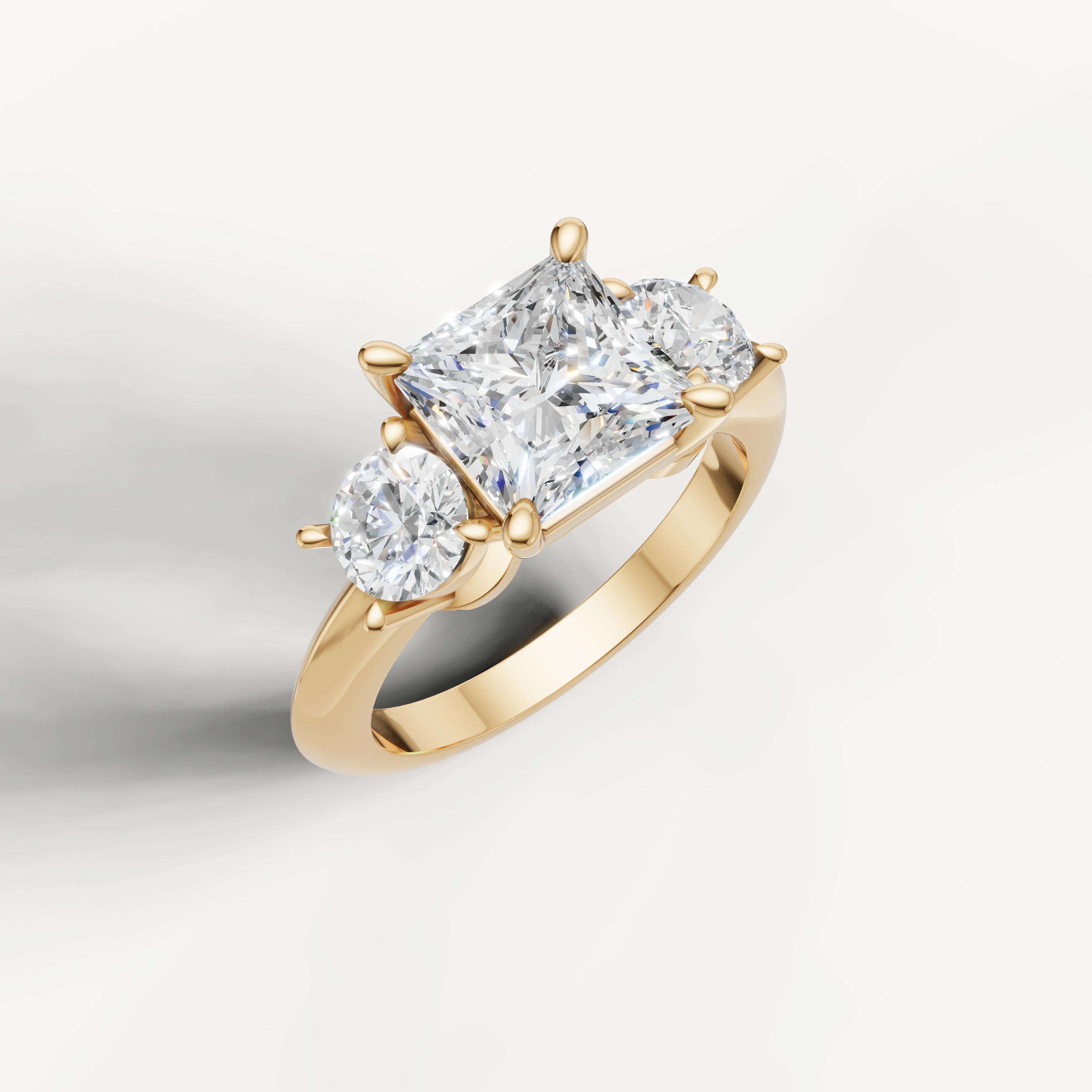 Three stone princess cut lab grown diamond ring in yellow gold classic setting