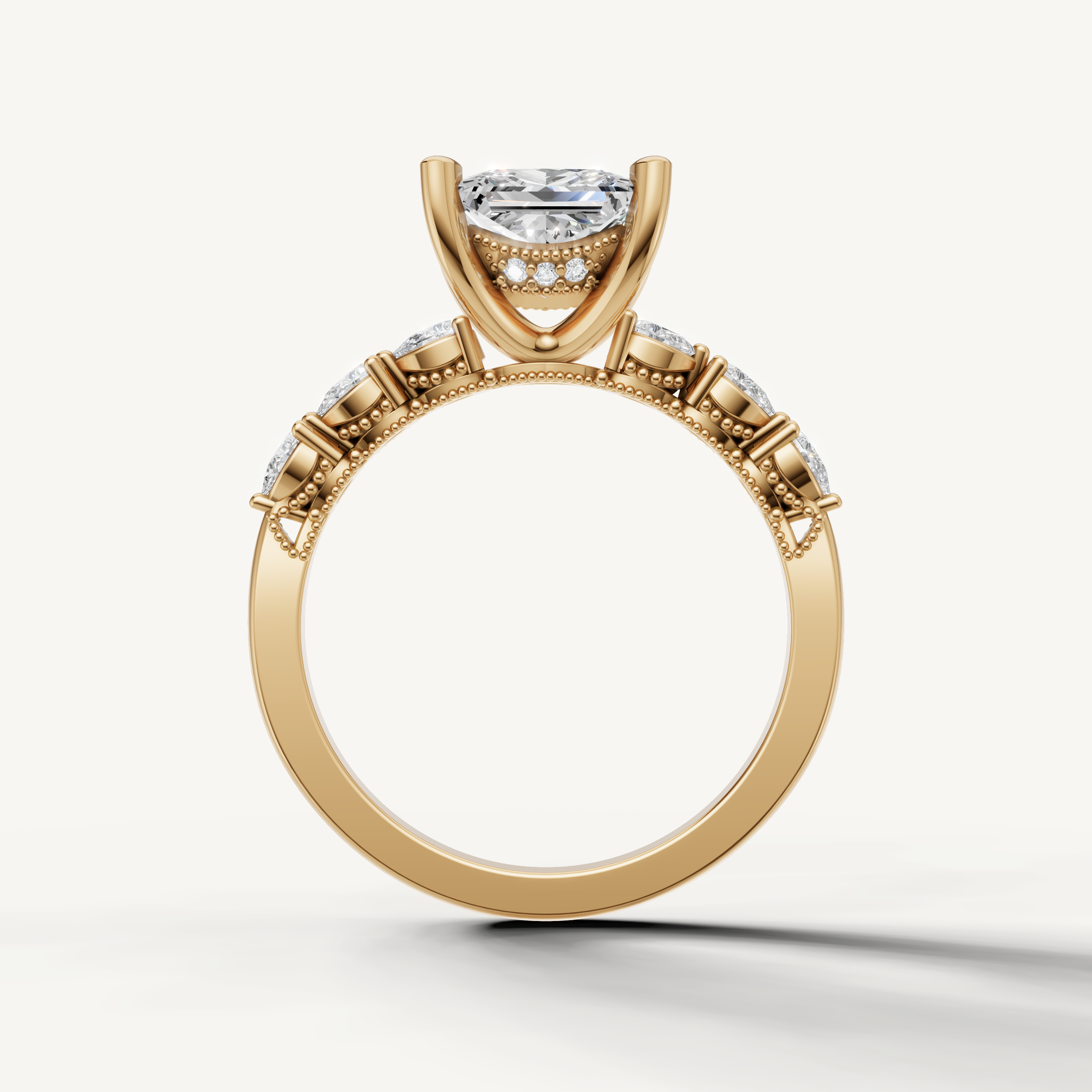 Princess cut lab grown diamond solitaire ring in yellow gold with marquise accent diamonds by Raul Diamonds