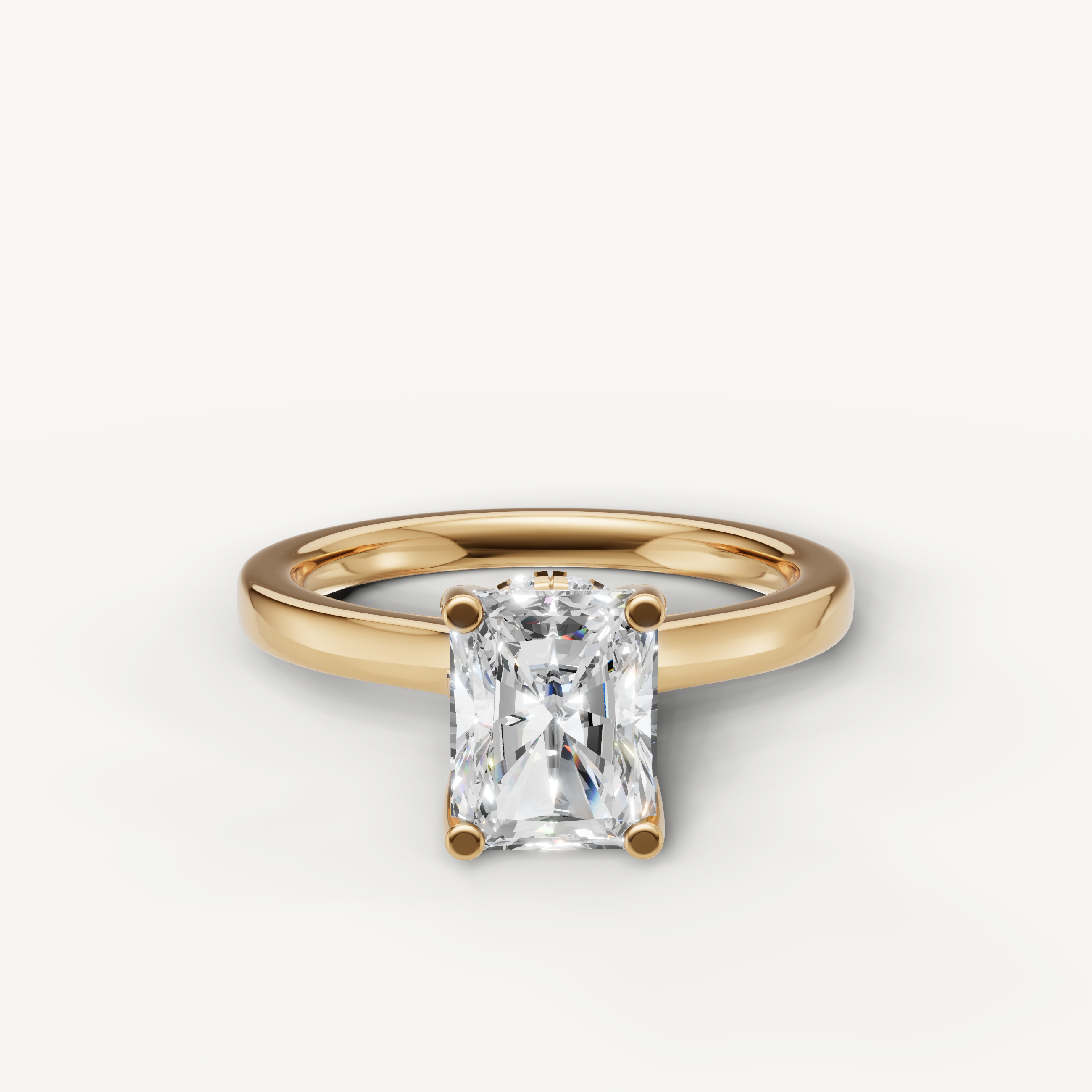 radiant cut lab grown diamond solitaire engagement ring in 14k yellow gold