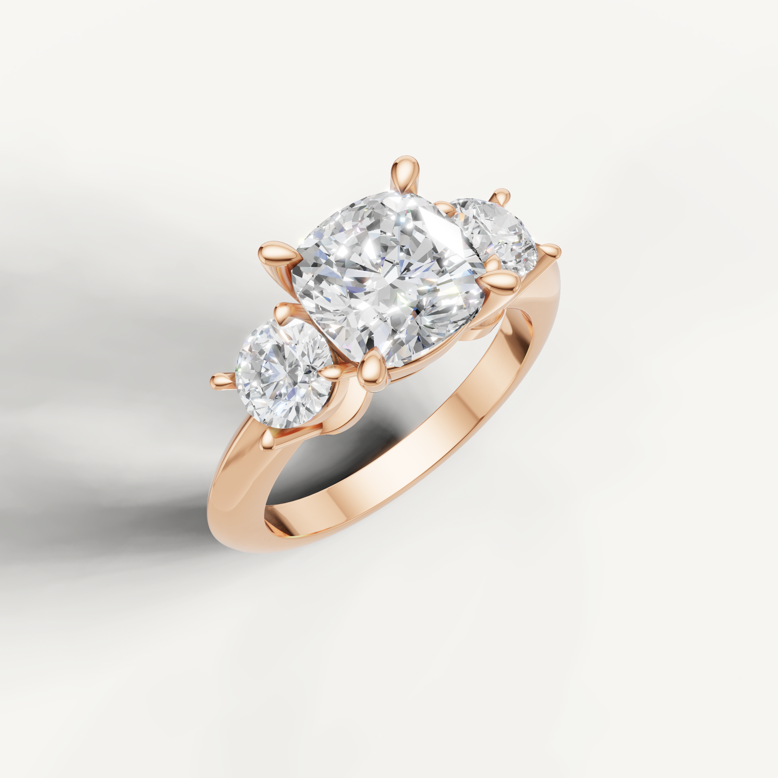 IGI certified cushion lab diamond ring with round side stones rose gold DEF VVS