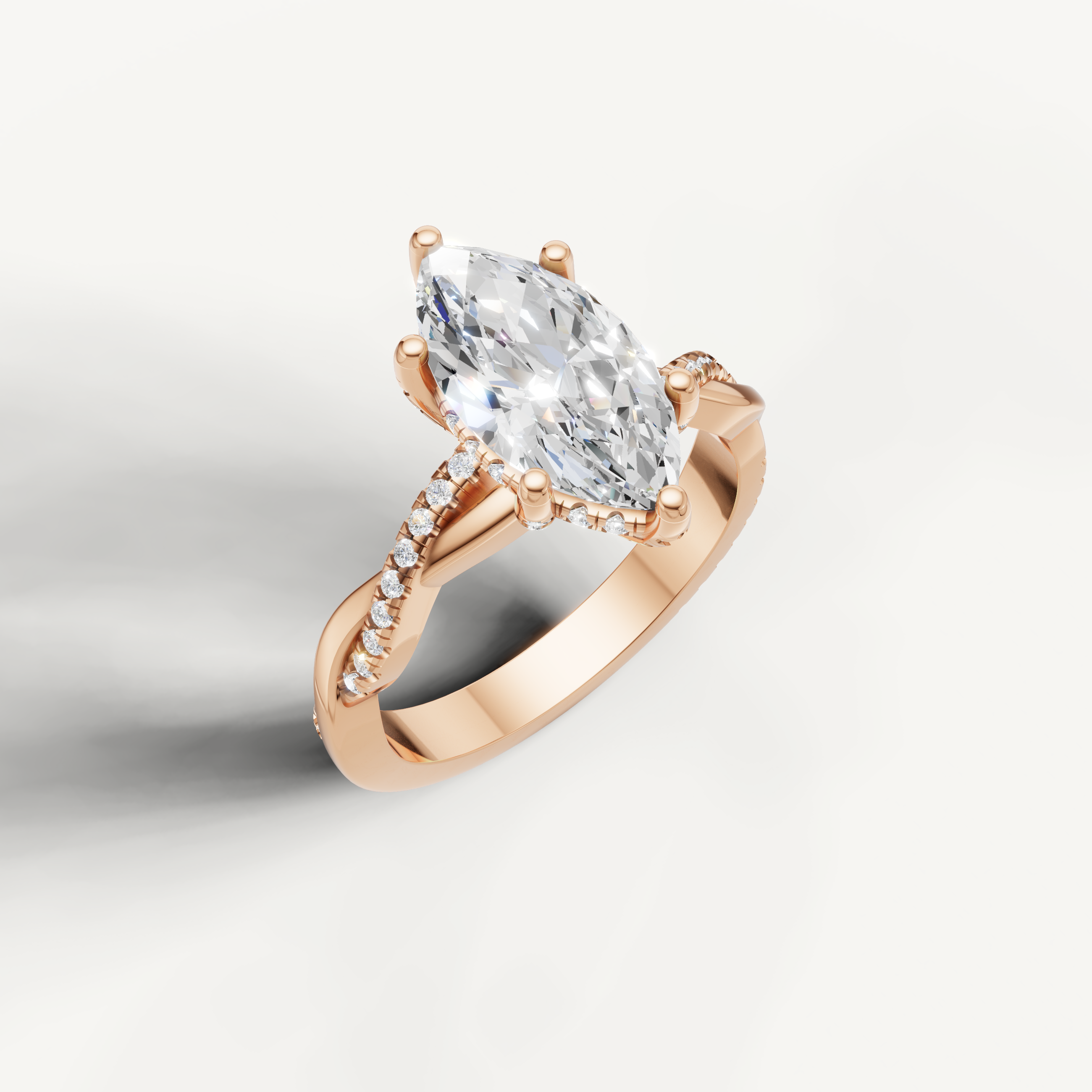 romantic marquise lab grown diamond engagement ring in 14k rose gold with twisted pavé crossover band