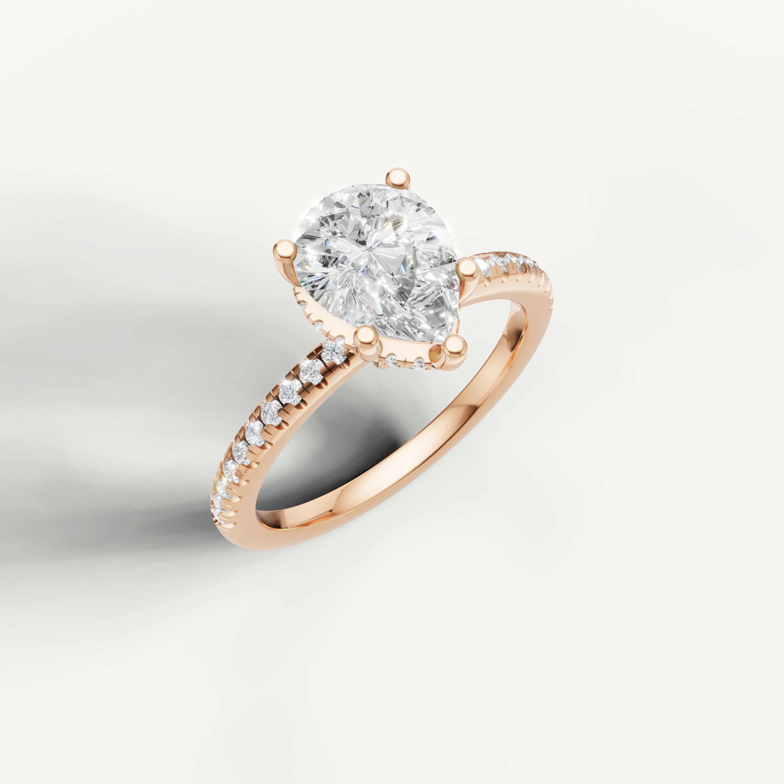 IGI certified pear shaped lab diamond solitaire ring with delicate pavé shank rose gold