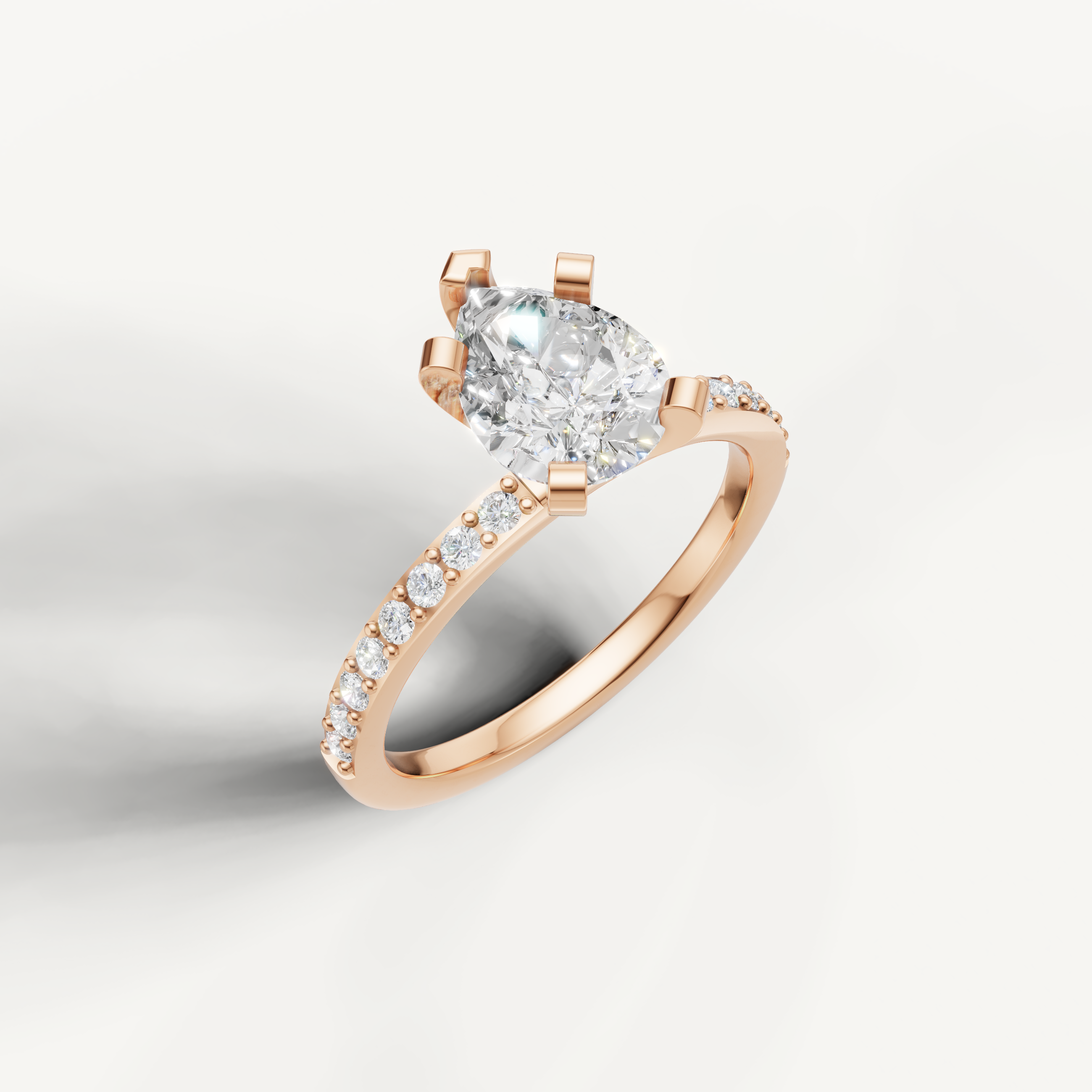 romantic pear cut diamond ring with shimmering pavé band