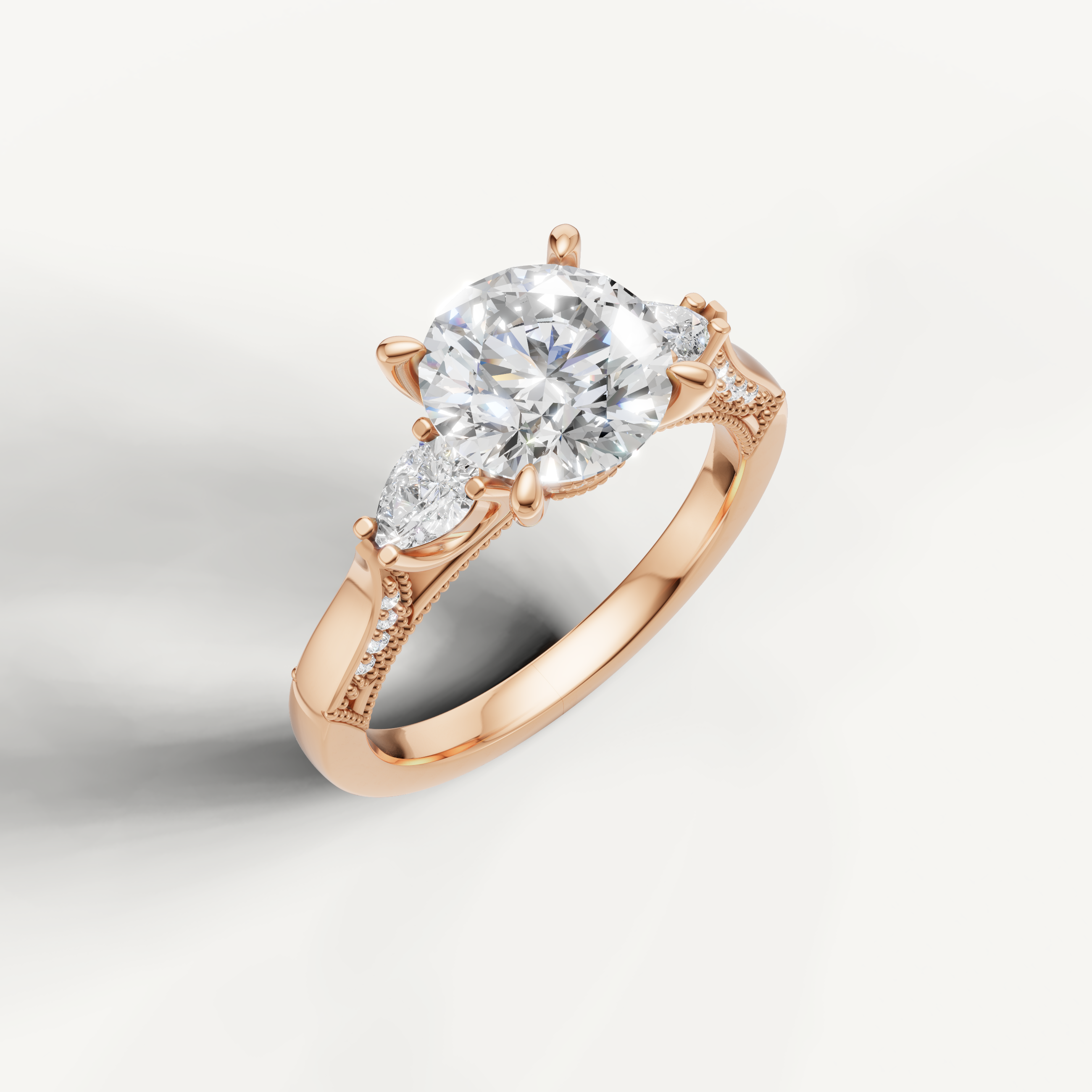 IGI certified round lab diamond ring with pear side accents rose gold