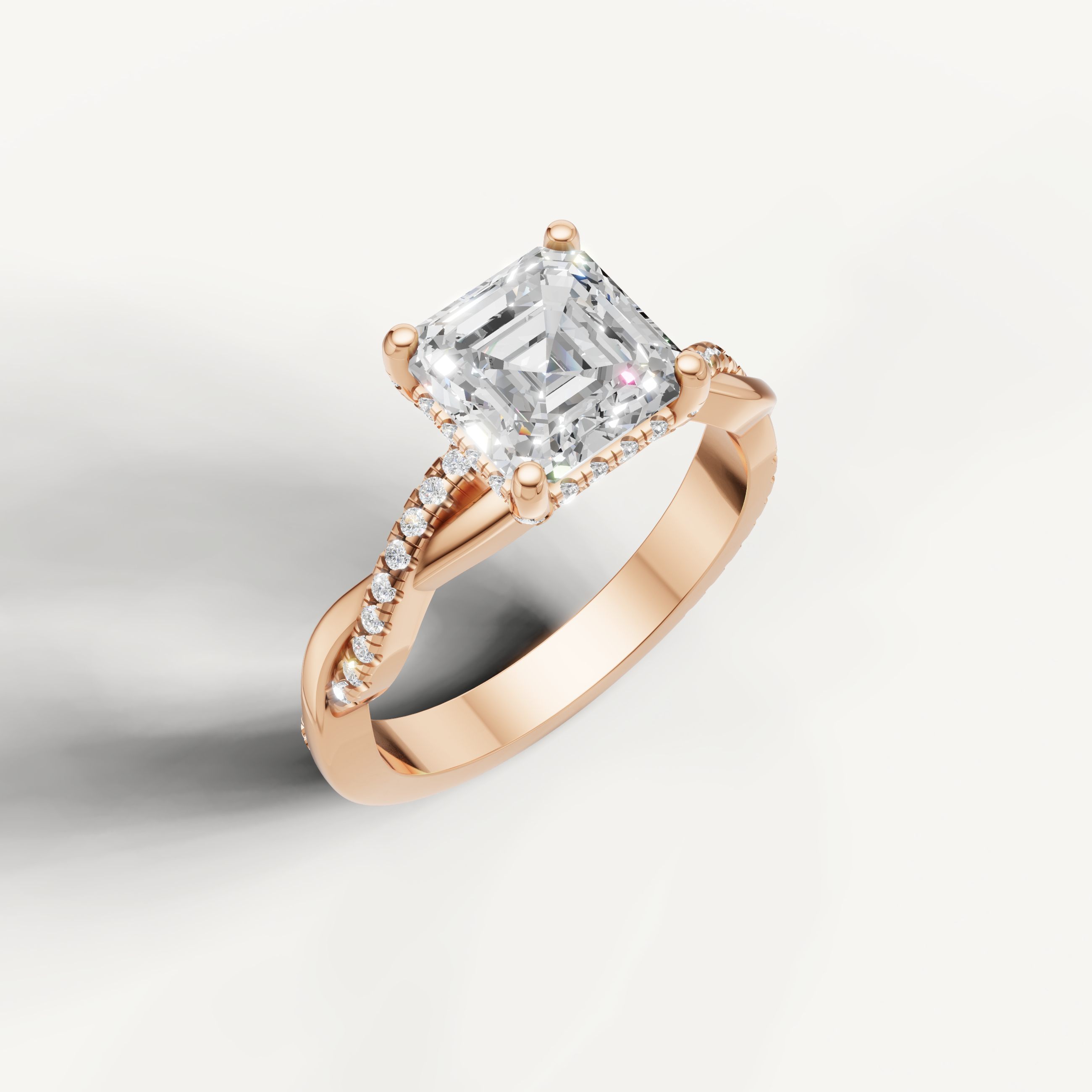 romantic asscher cut lab grown diamond engagement ring in 14k rose gold with twisted pavé diamond band