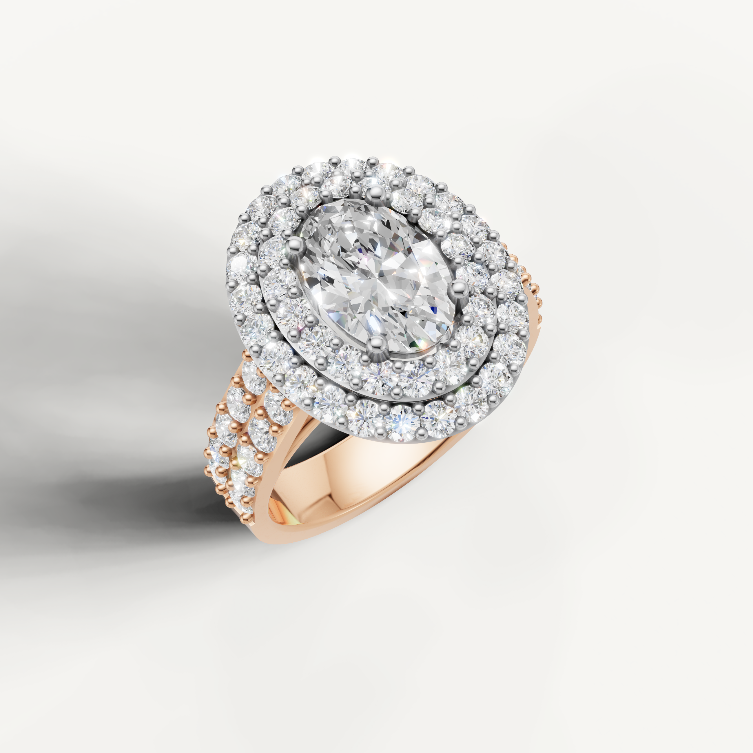 Double halo oval cut diamond ring in rose gold by Raul Diamonds