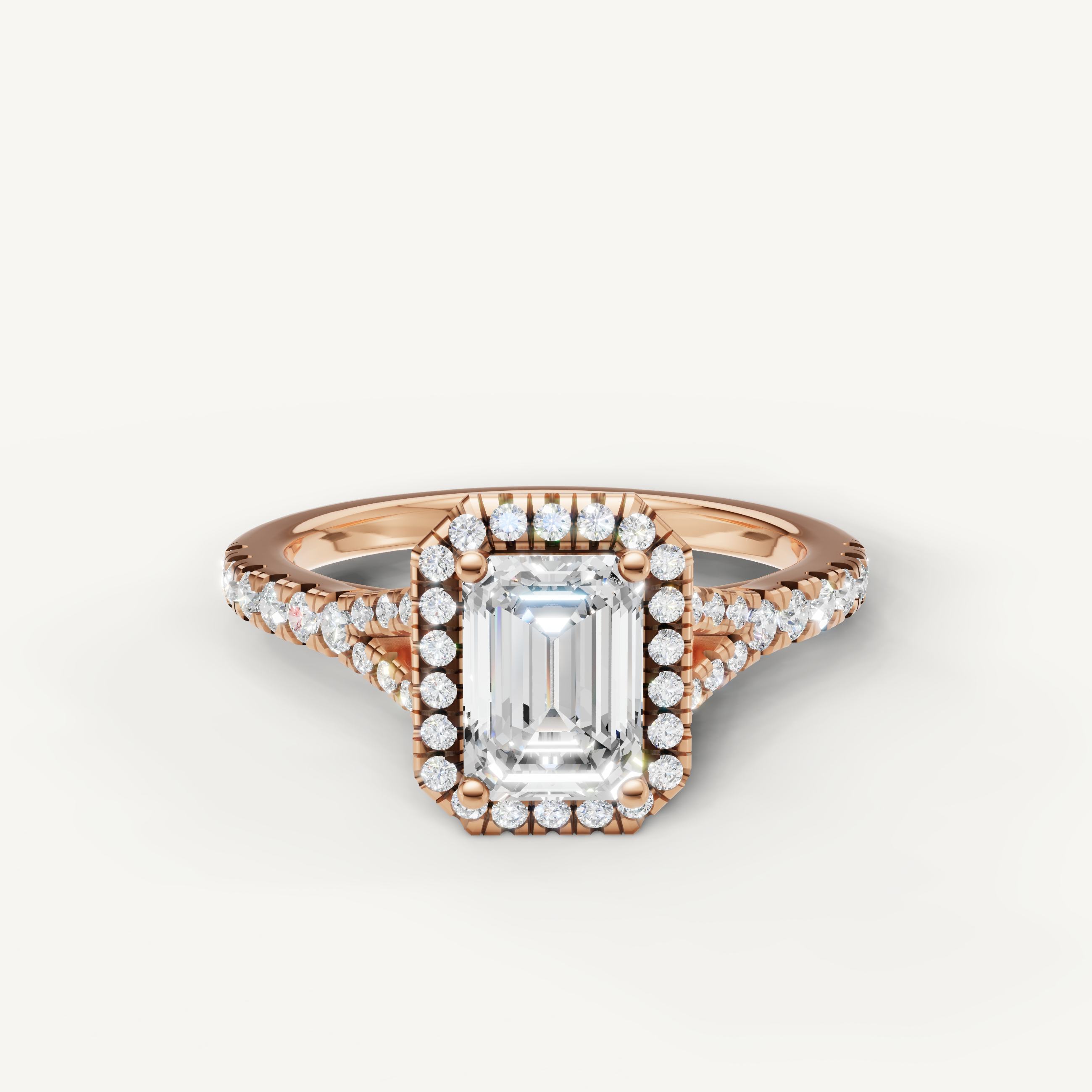 Emerald cut halo pavé lab grown diamond engagement ring in 14K rose gold