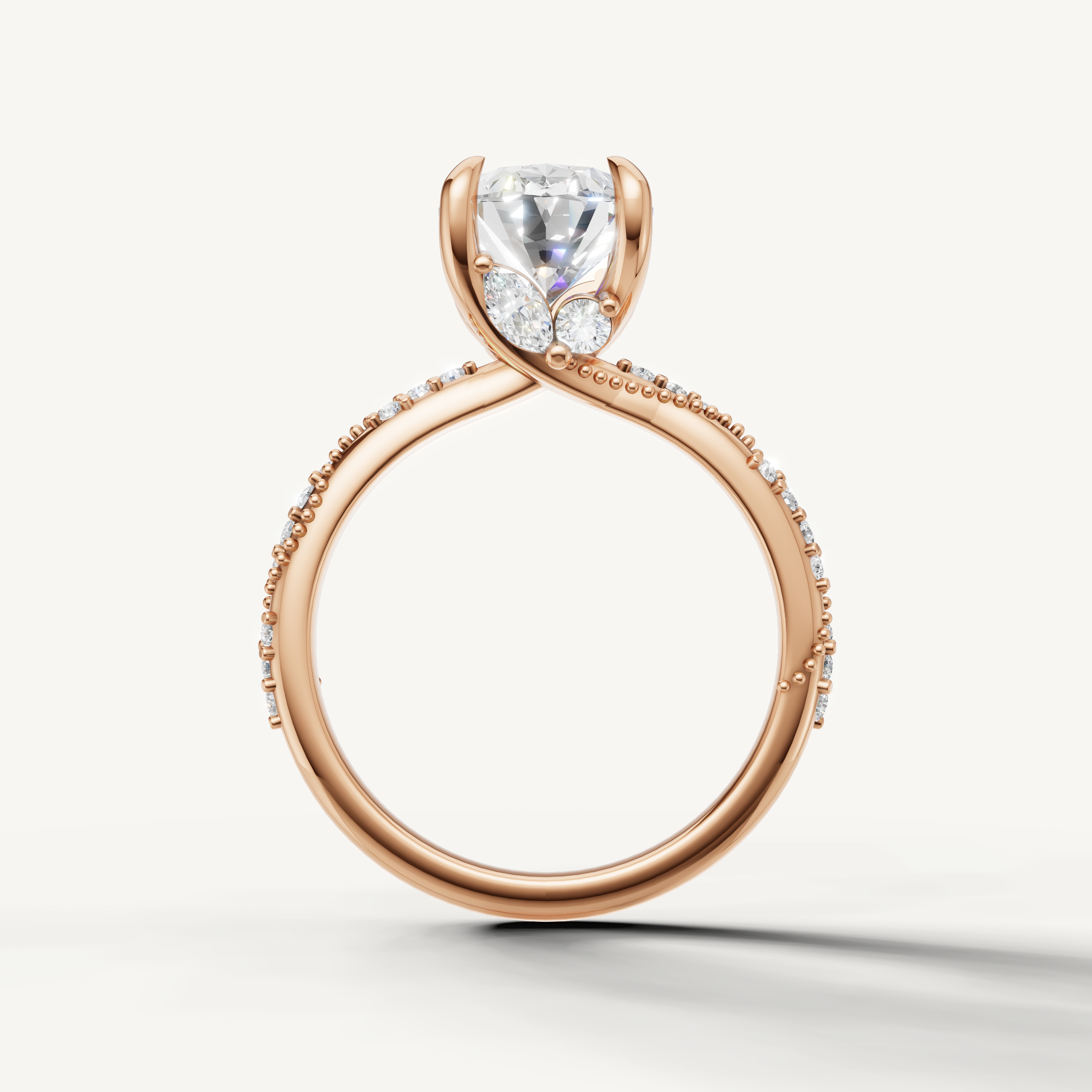 oval diamond engagement ring with elegant crossover pavé band rose gold