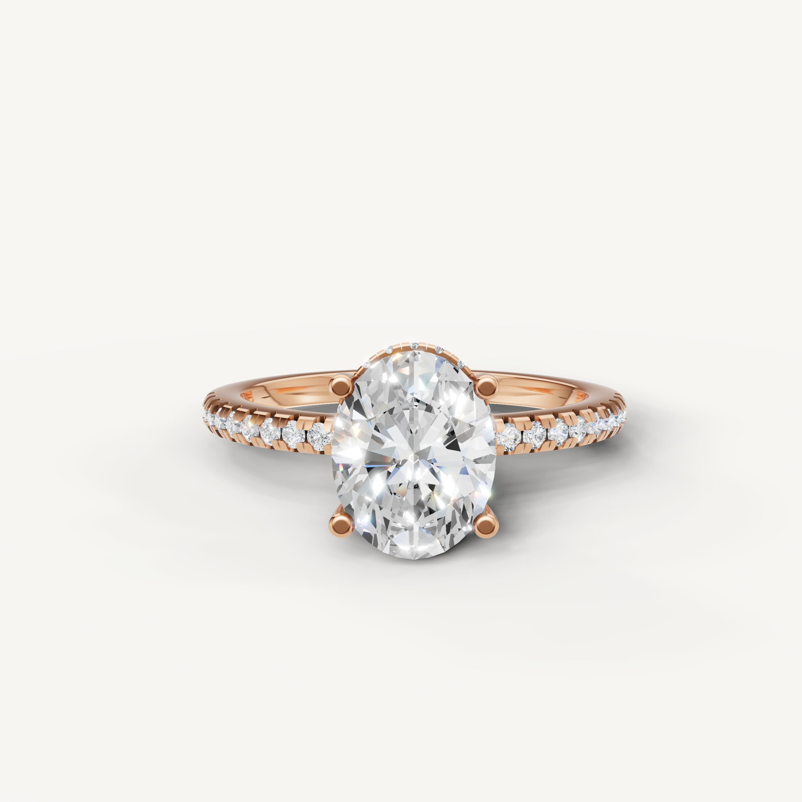 oval cut lab grown diamond engagement ring with pavé band in 14k rose gold