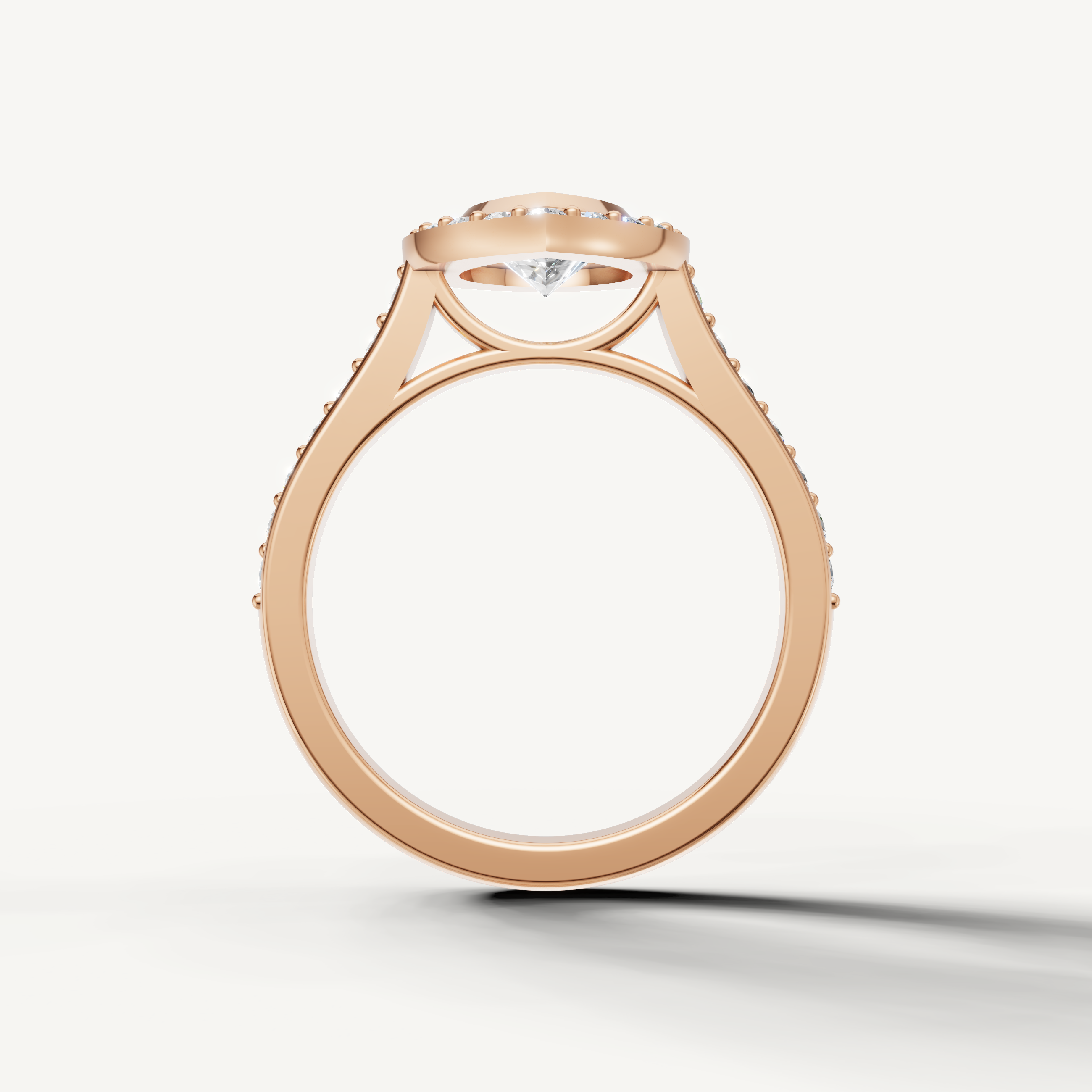 White gold pear diamond halo engagement ring with luxury pavé setting