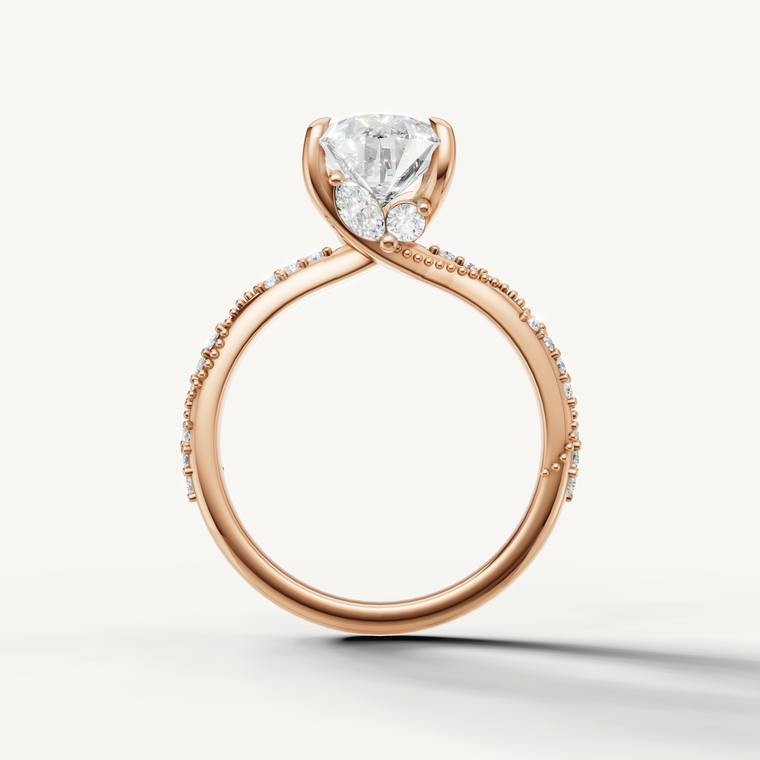 pear diamond engagement ring with elegant crossover pavé band rose gold