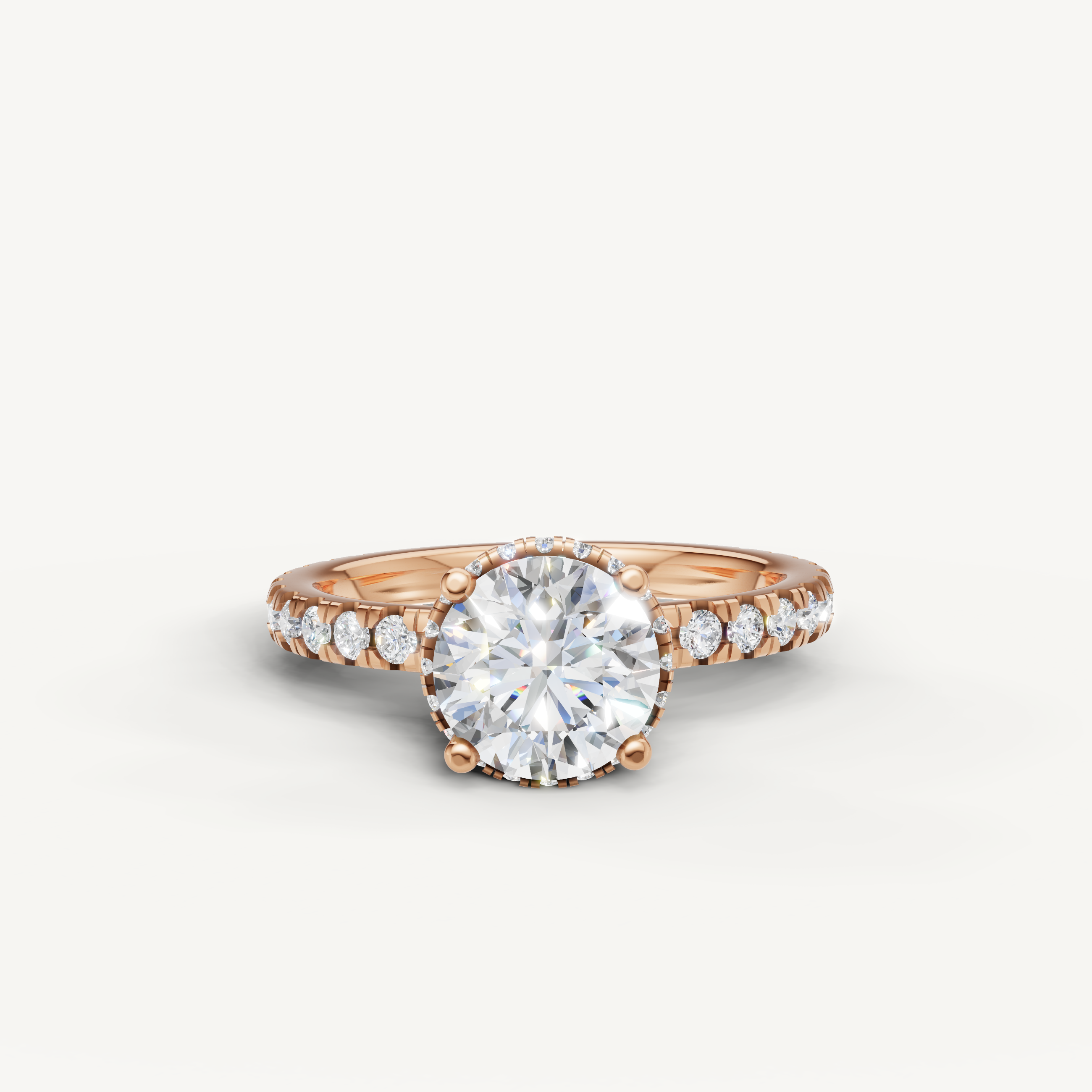 round brilliant cut lab grown diamond hidden halo engagement ring in 14k rose gold with pavé diamond band