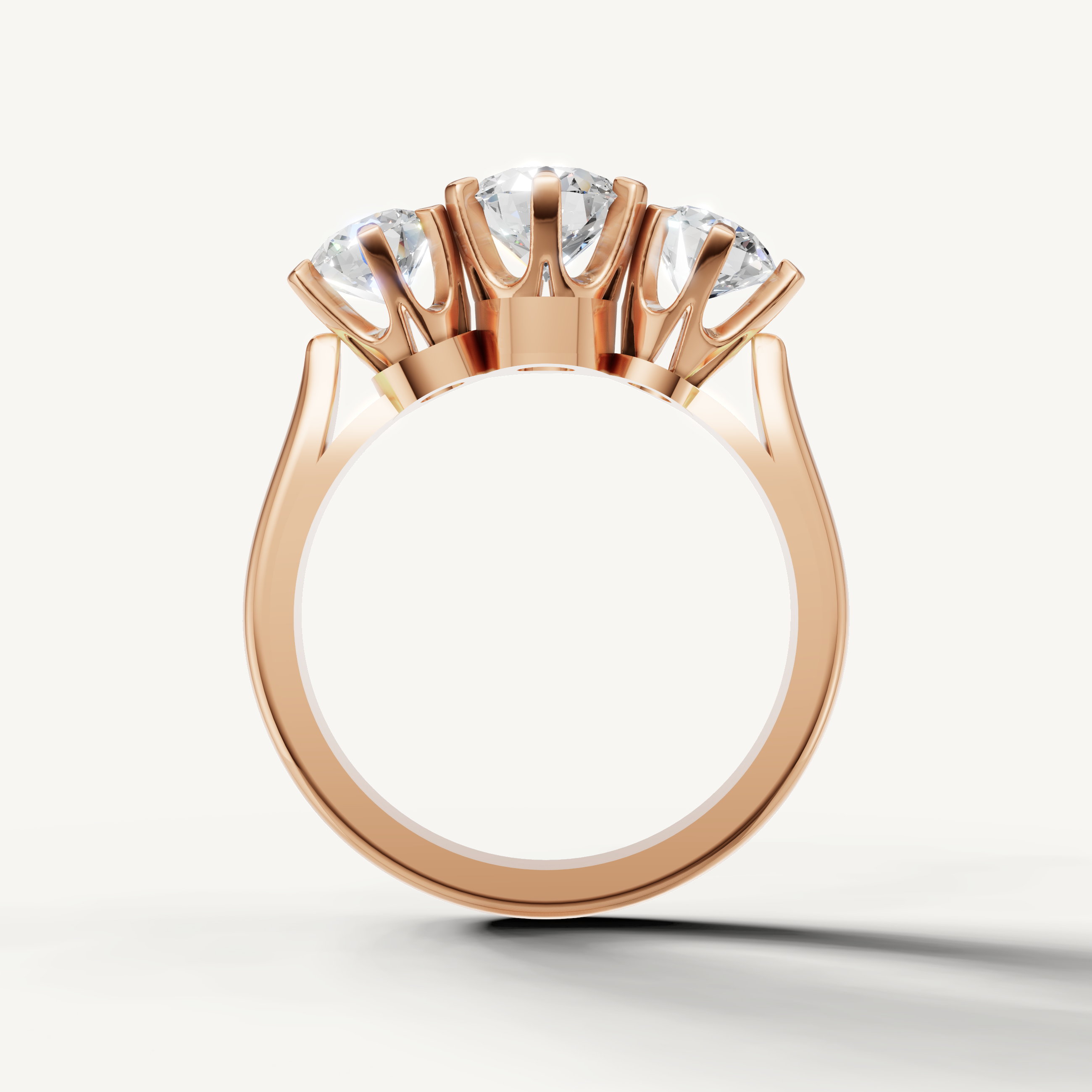 White gold round diamond engagement ring with three stone setting by Raul Diamonds
