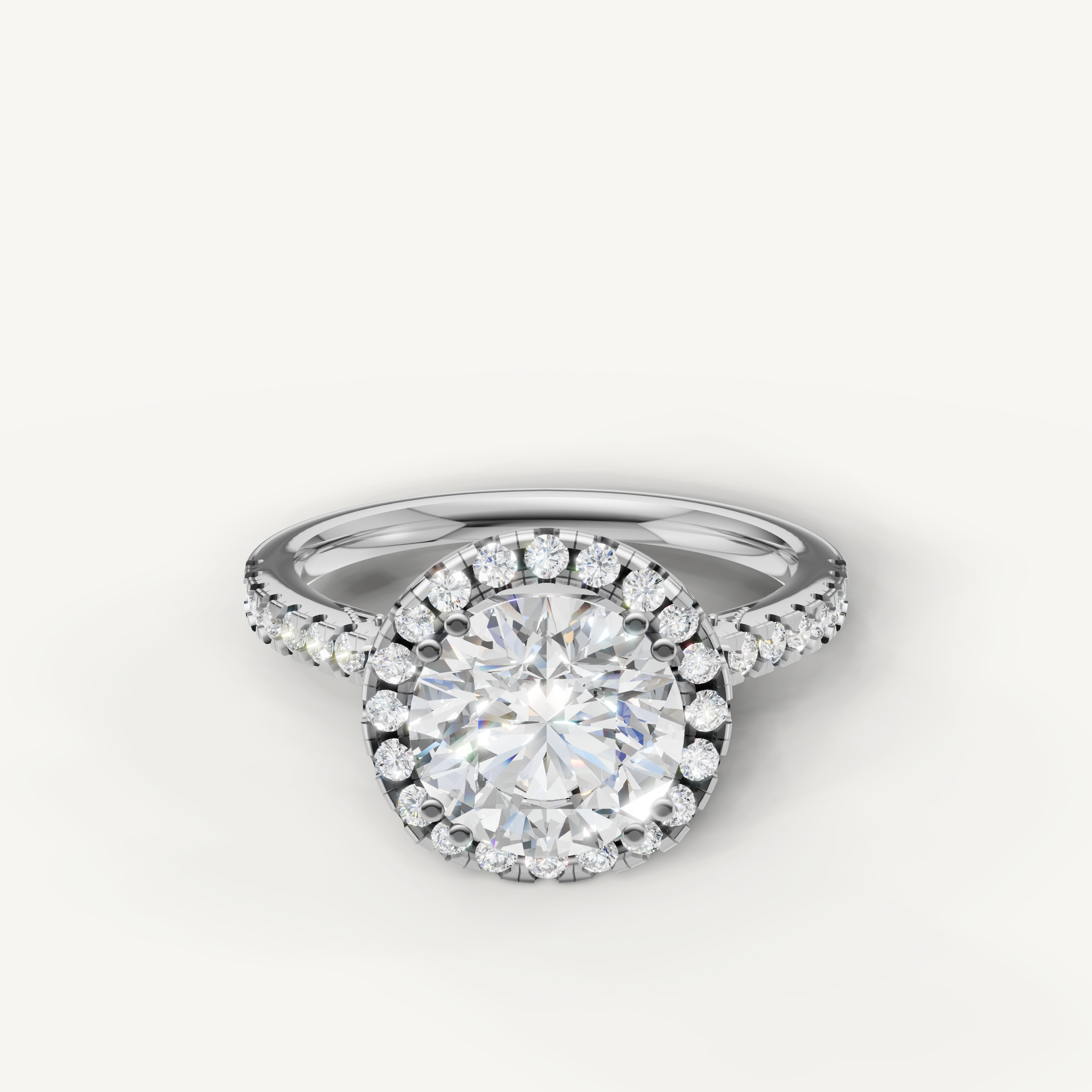 Round cut lab grown diamond halo engagement ring in 14K white gold with pavé diamond band by Raul Diamonds