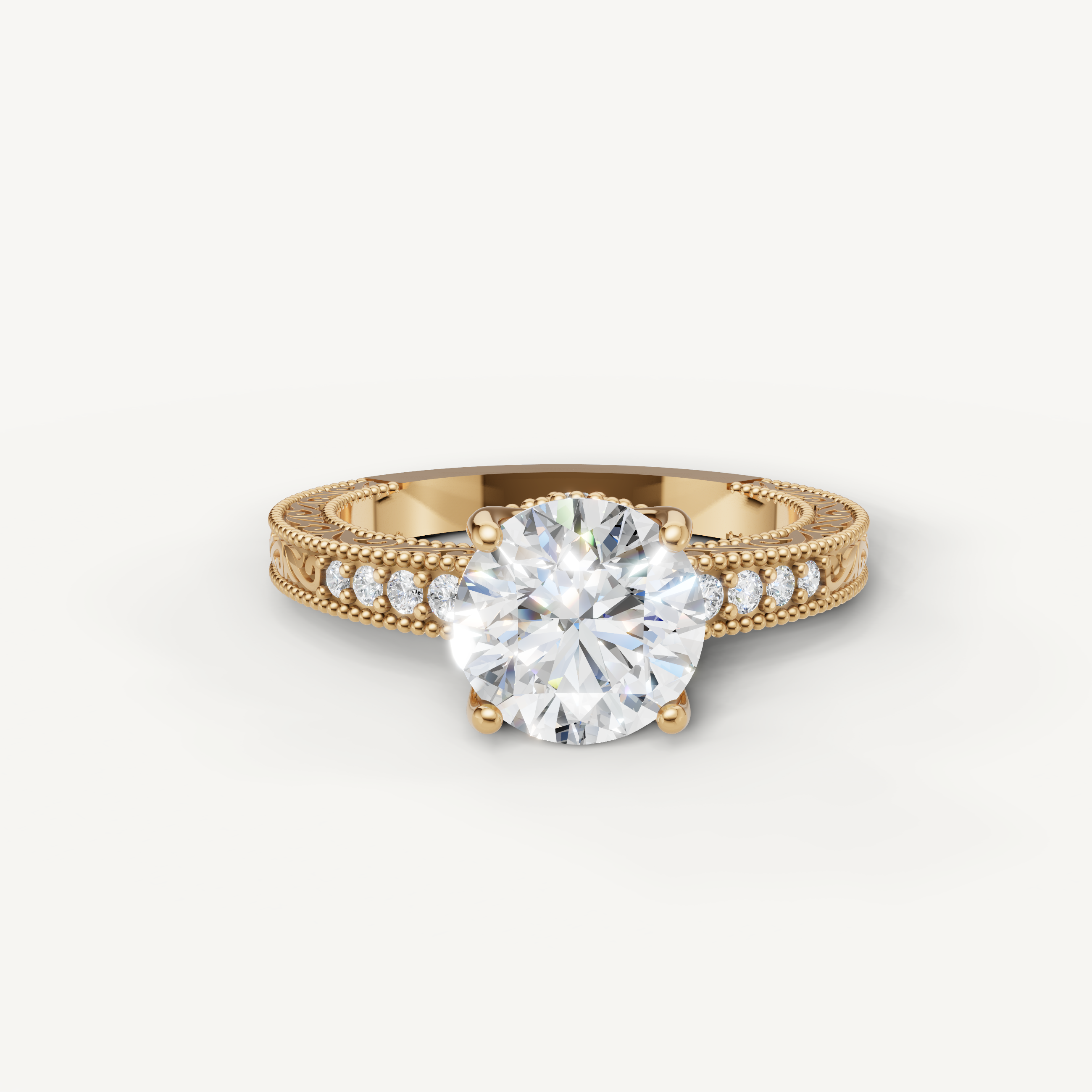 Vintage round cut lab grown diamond engagement ring in 14K yellow gold with intricate milgrain and pavé detailing by Raul Diamonds.