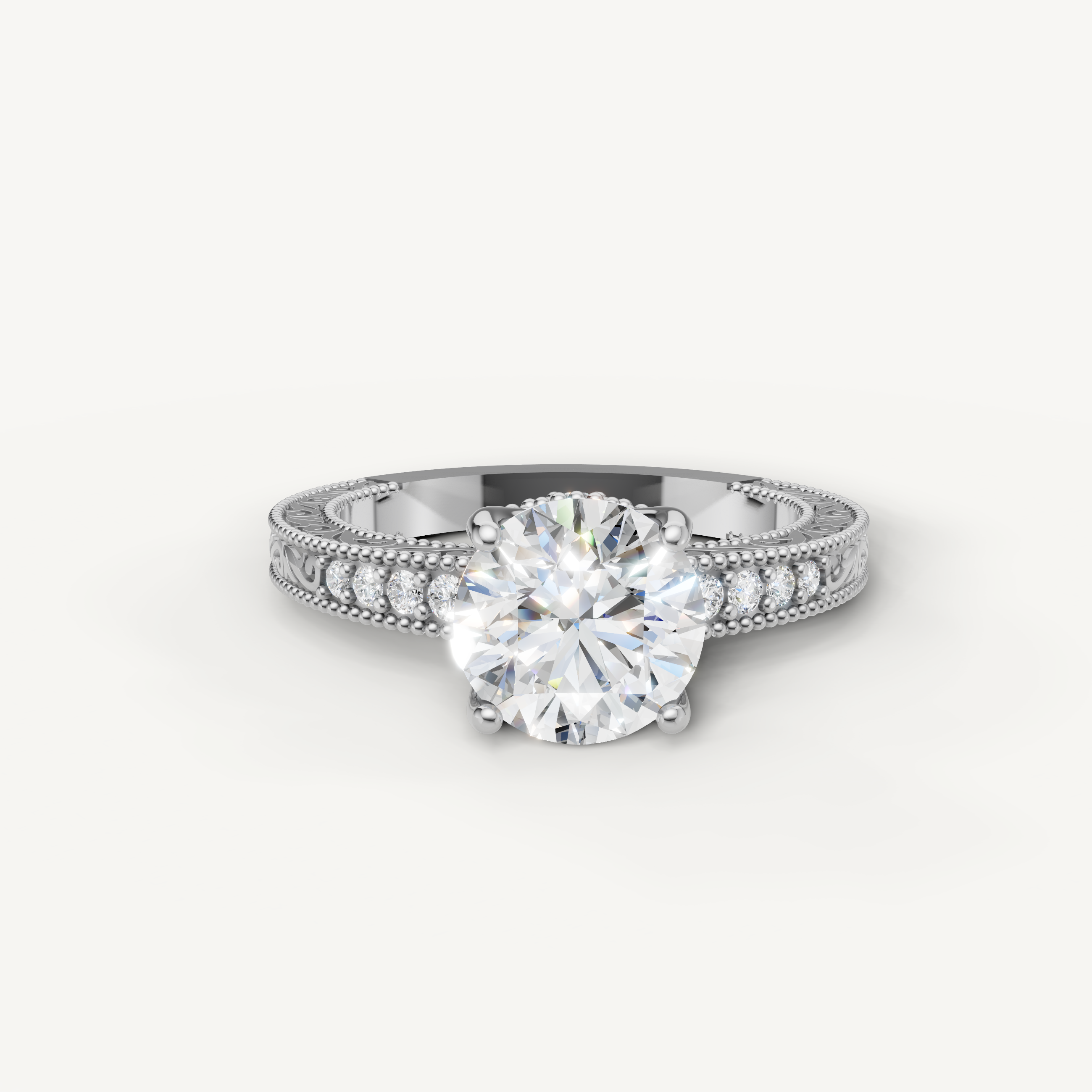 Vintage round cut lab grown diamond engagement ring in 14K white gold with ornate milgrain and pavé accents by Raul Diamonds.