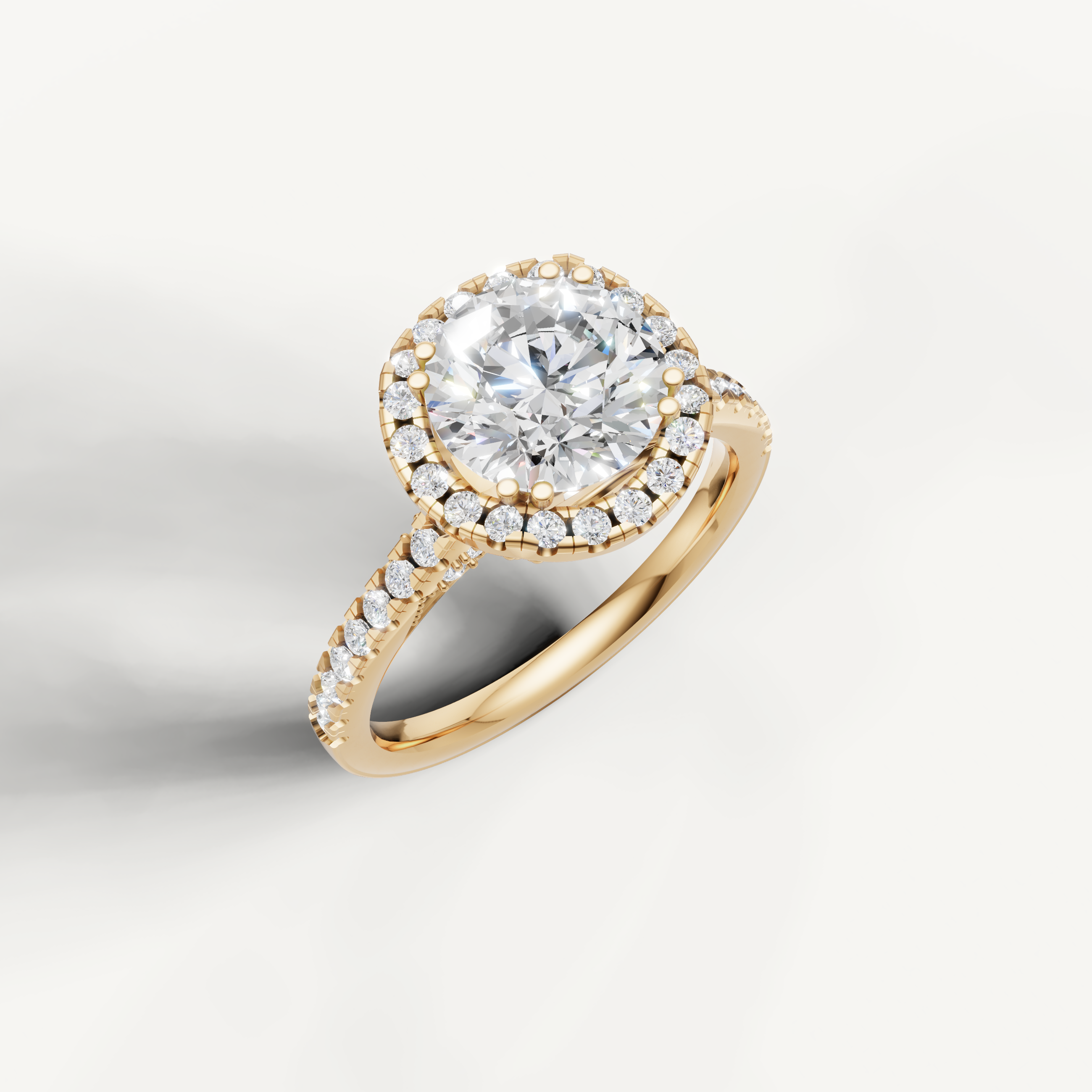 14K yellow gold round lab diamond engagement ring with sparkling halo and pavé shank from Raul Diamonds